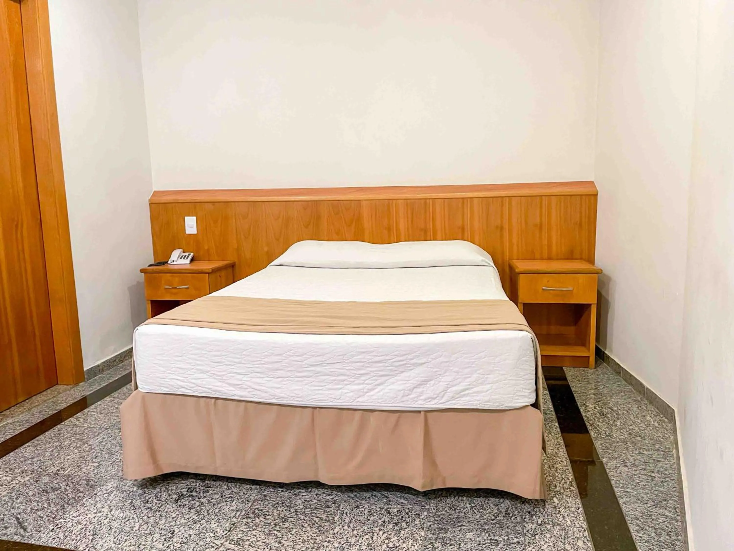 Bed in Saionara Hotel