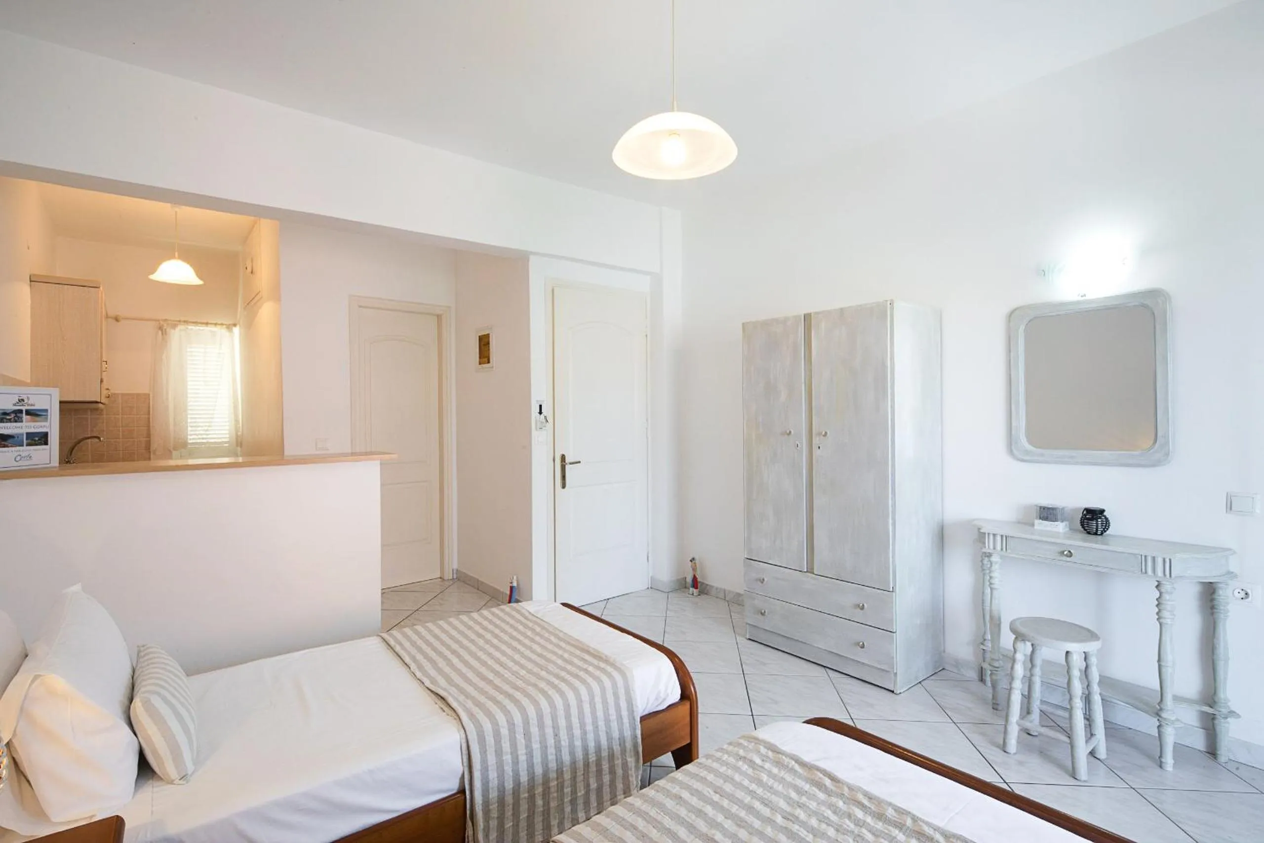 Bed in Irini Apartments and Studios