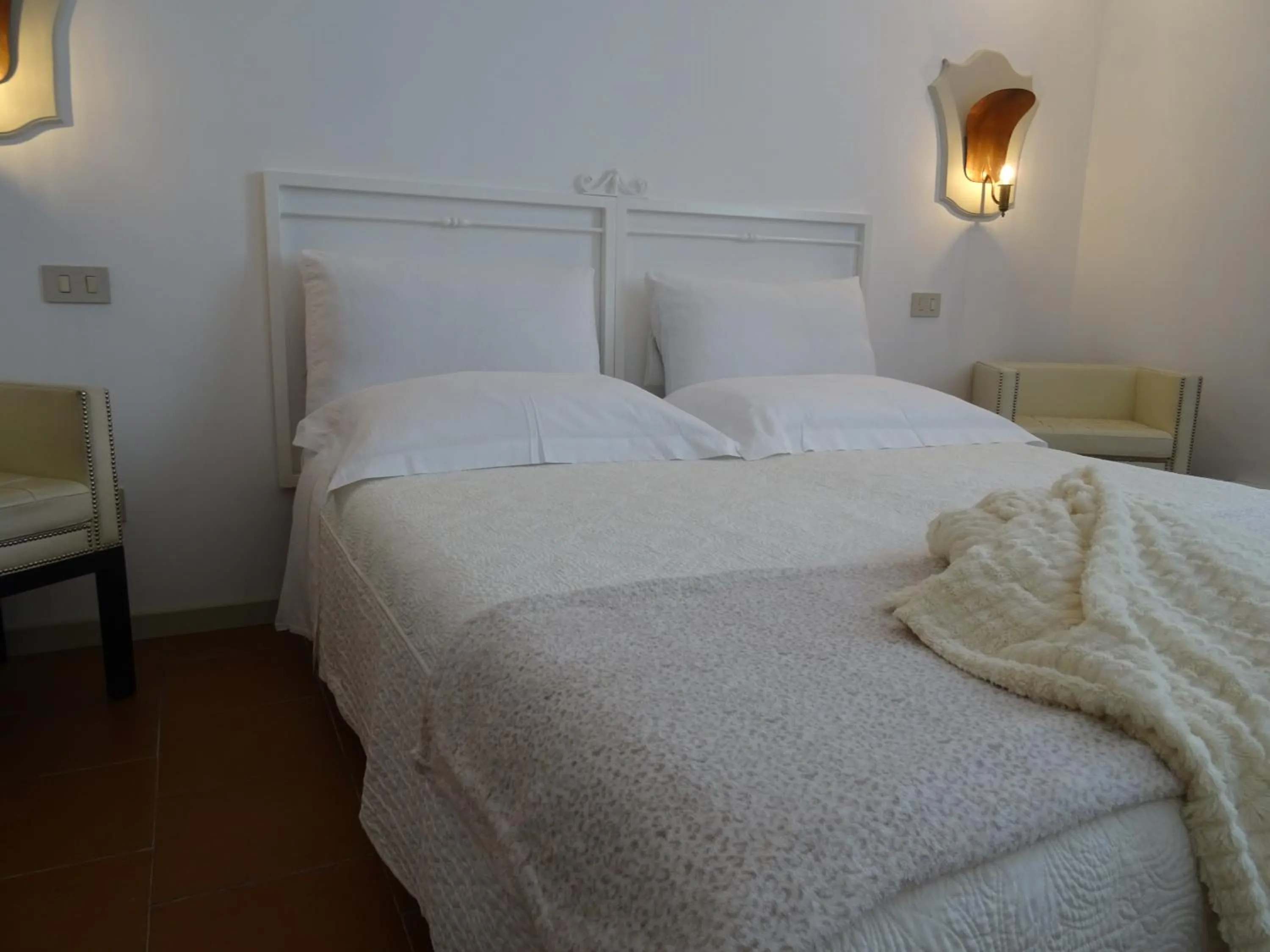 Bed in CharmeRooms Villa Moroni