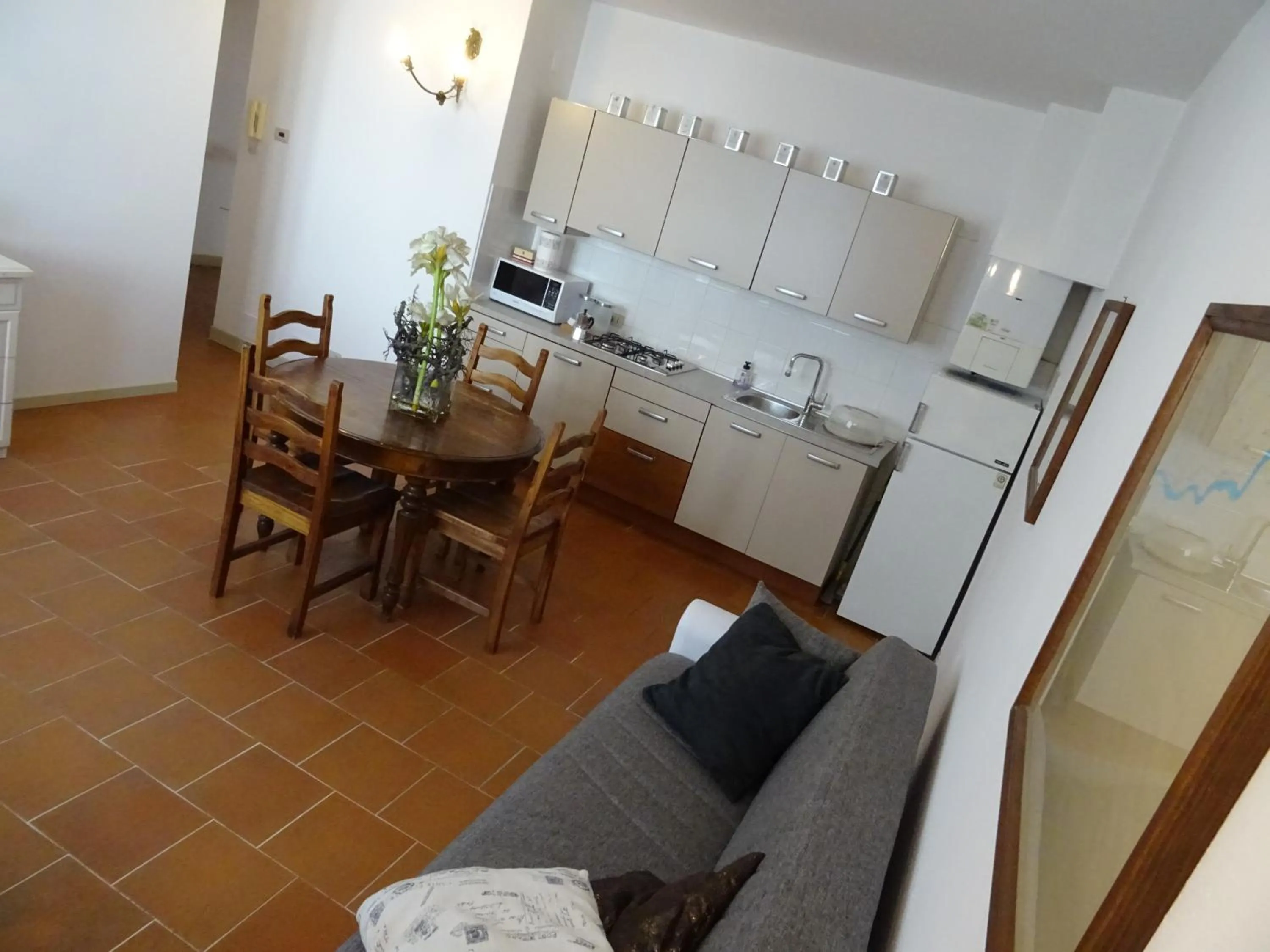 Kitchen or kitchenette in CharmeRooms Villa Moroni