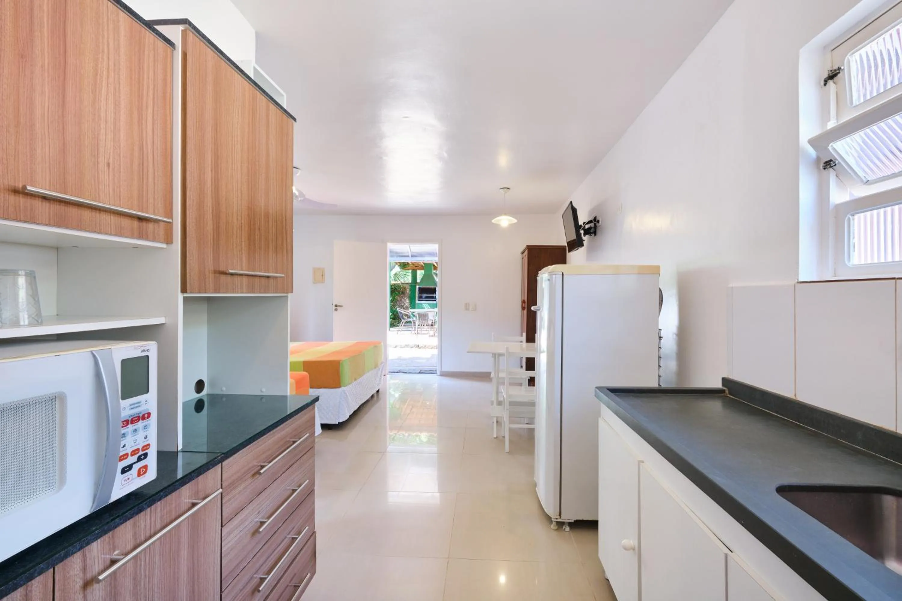 Kitchen or kitchenette in Pousada Sanremo Inn