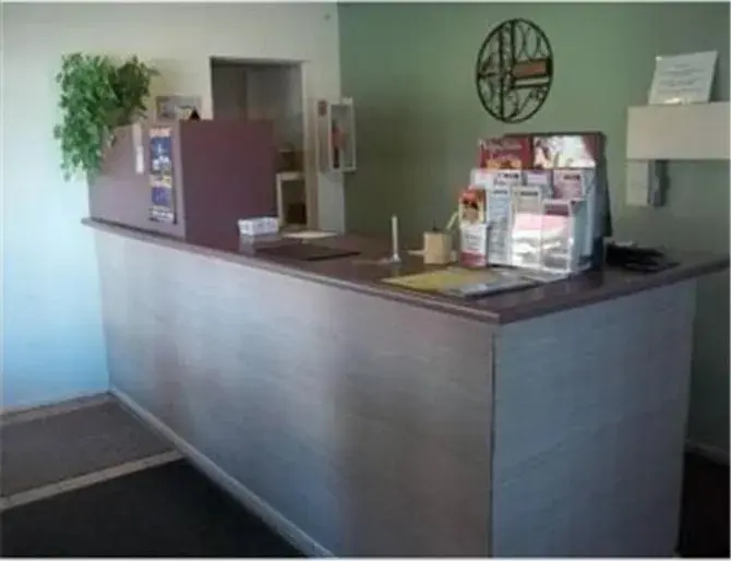 Lobby or reception in Cozy Inn Lobby or reception in Cozy Inn