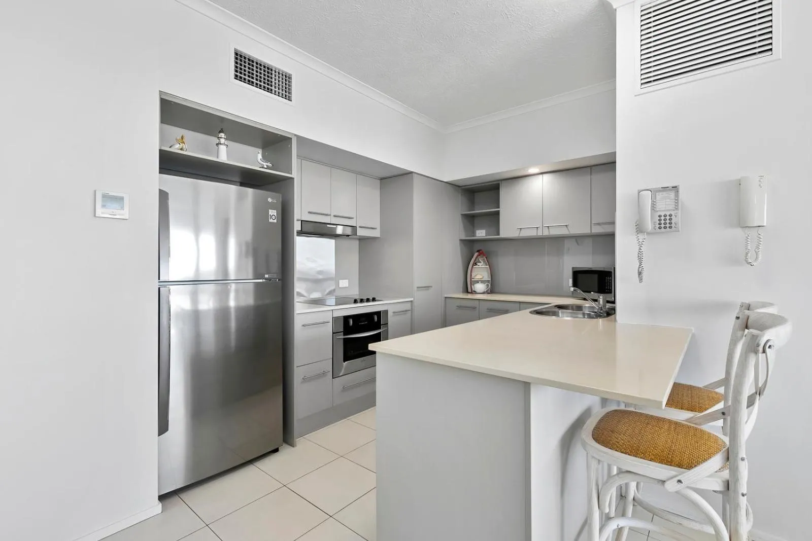 Kitchen or kitchenette in On The Beach Resort Bribie Island