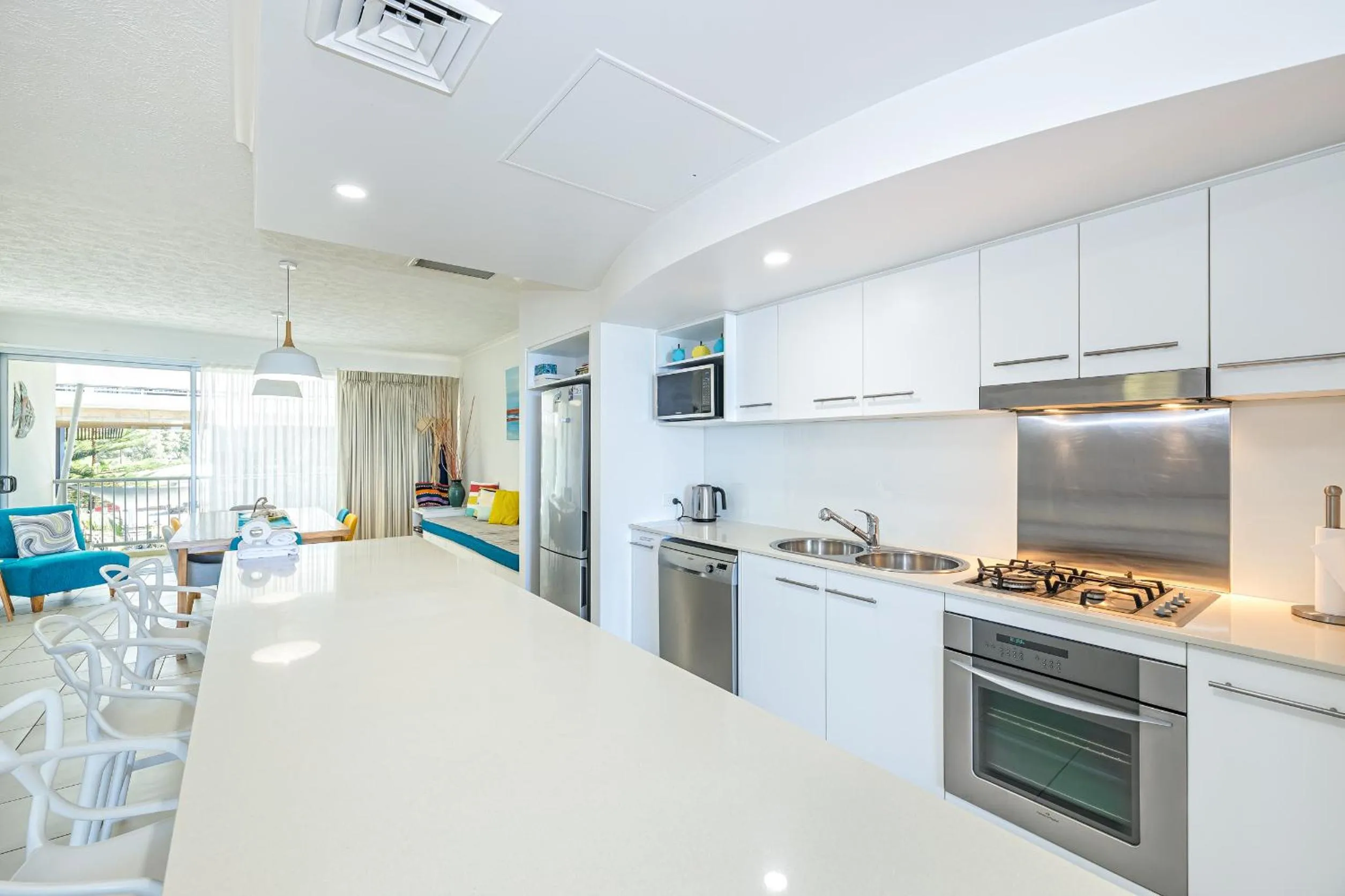 Kitchen or kitchenette in On The Beach Resort Bribie Island