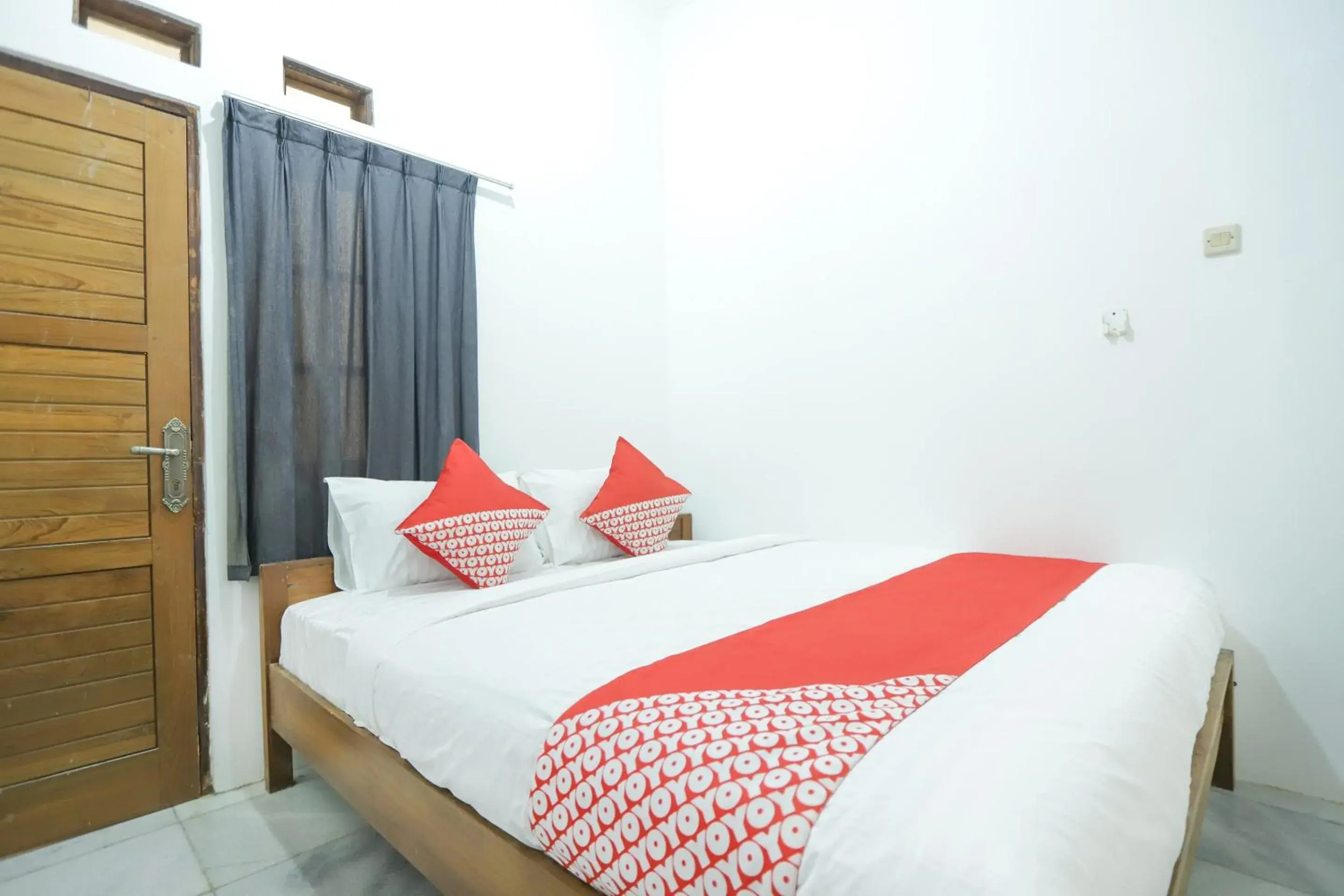 Bedroom in OYO 150 Harmoni Residence