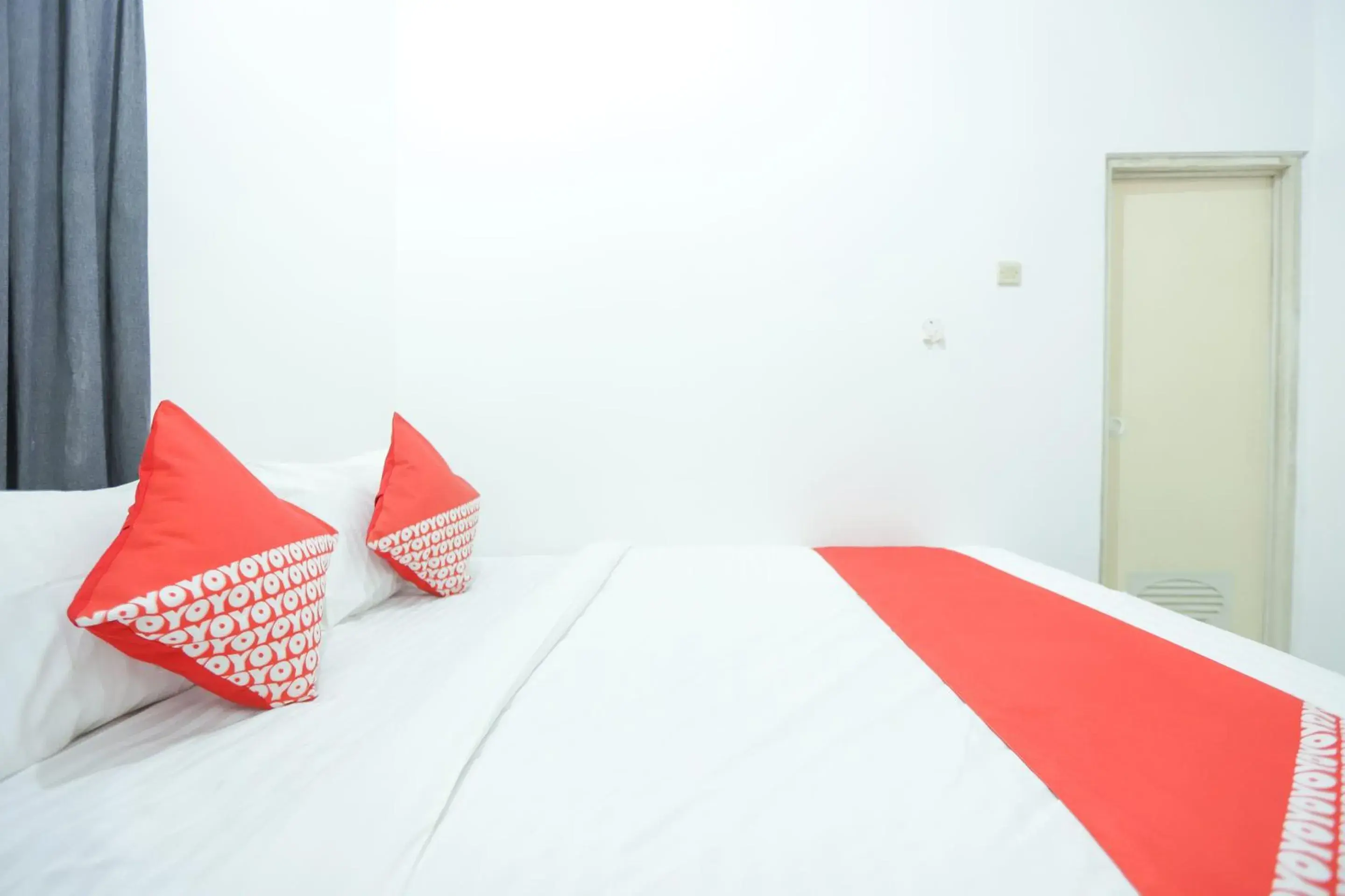 Bedroom in OYO 150 Harmoni Residence