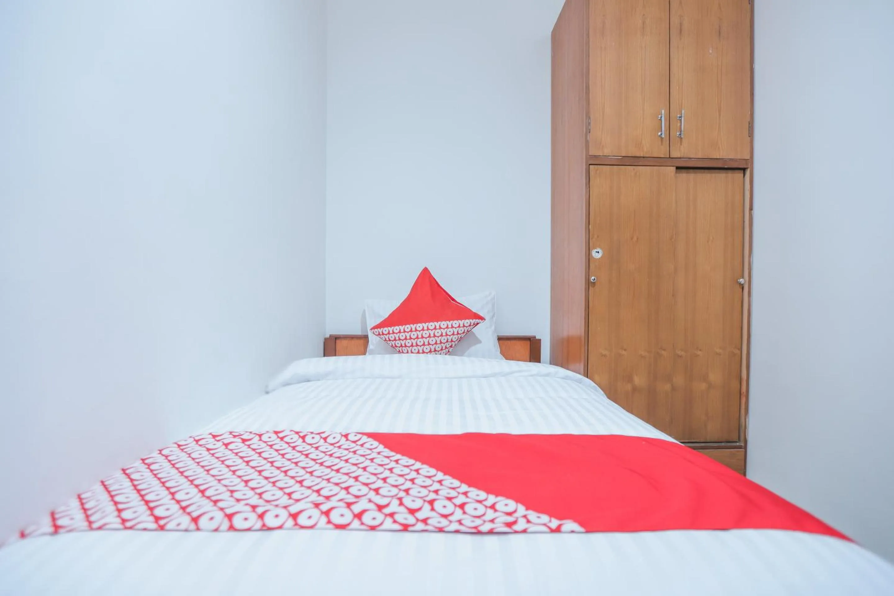 Bedroom in OYO 150 Harmoni Residence