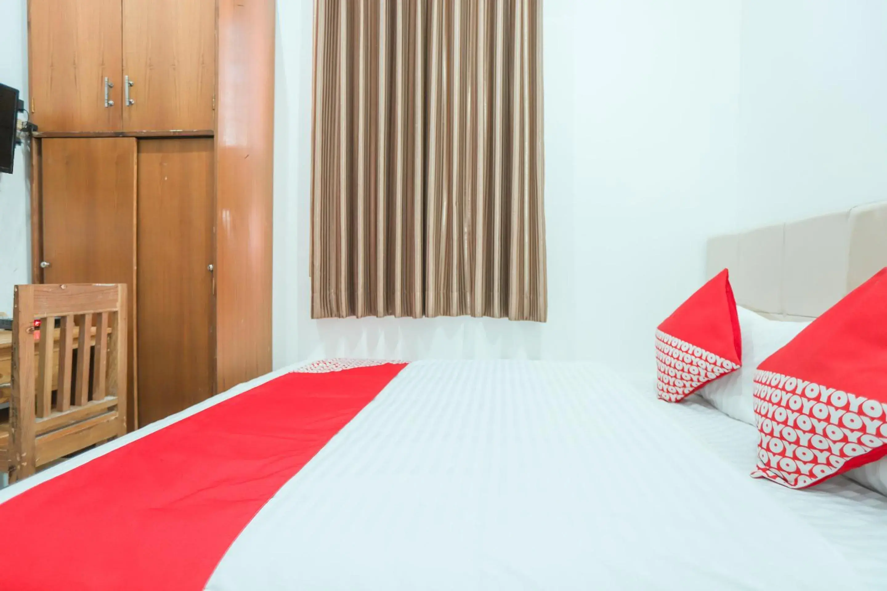 Bedroom in OYO 150 Harmoni Residence