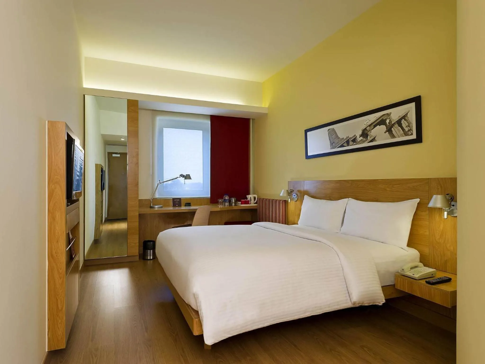 Bedroom, Bed in ibis Nashik - An Accor Brand