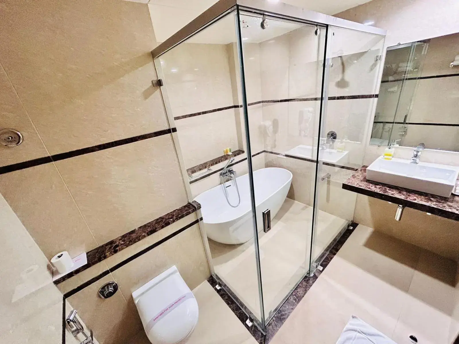 Bathroom in Boulevard 9 Luxury Resort & Spa Bathroom in Boulevard 9 Luxury Resort & Spa