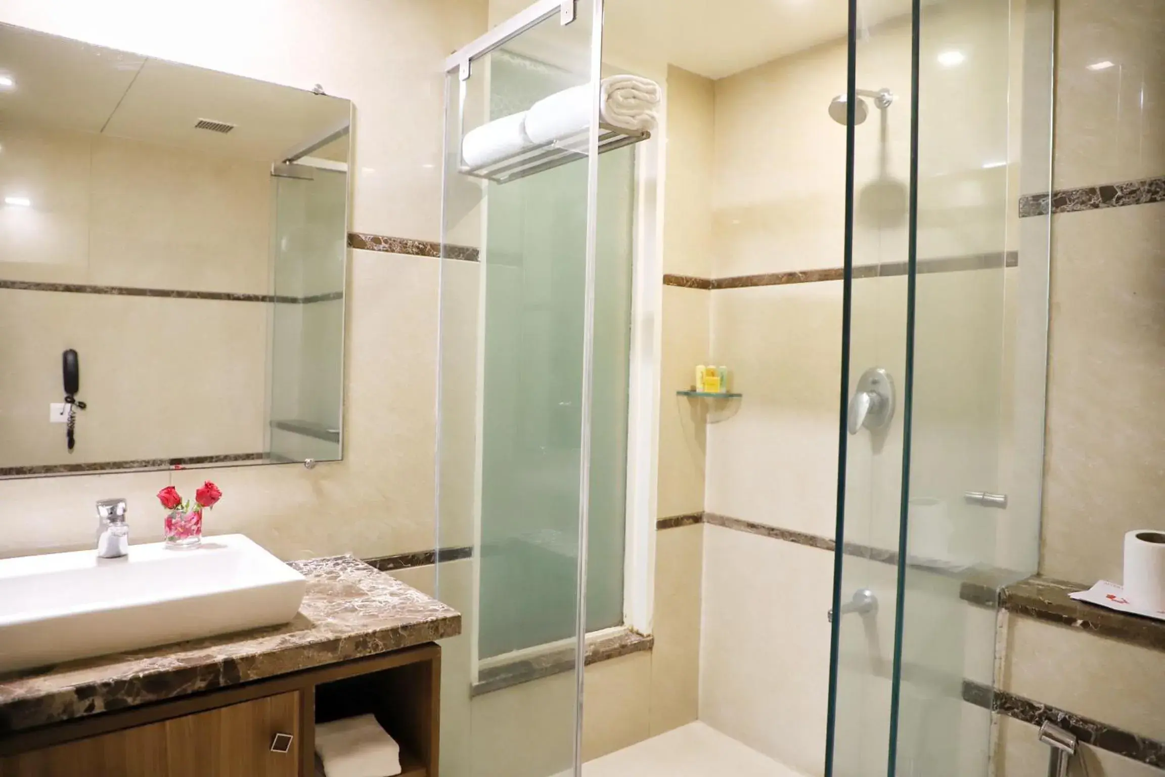Bathroom in Boulevard 9 Luxury Resort & Spa Bathroom in Boulevard 9 Luxury Resort & Spa