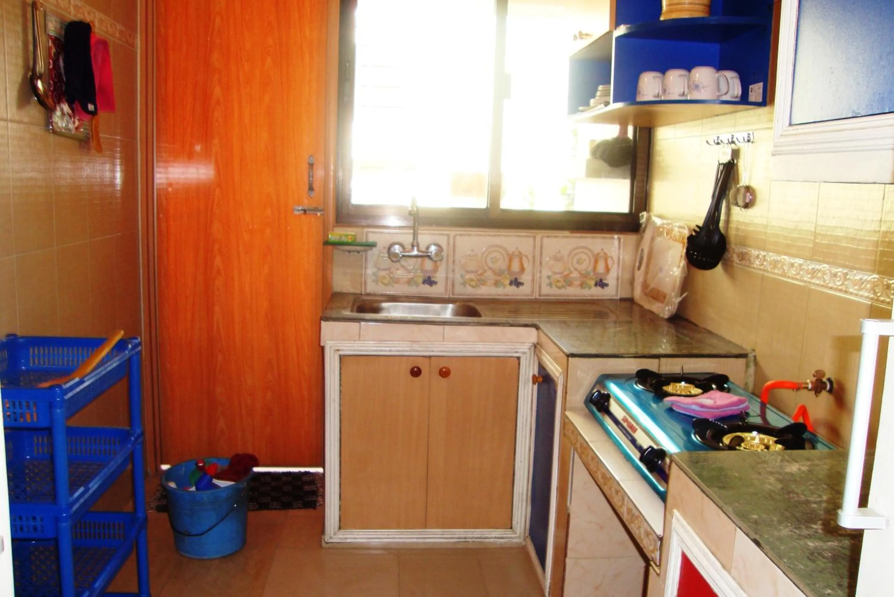 Kitchen or kitchenette in Babylon Hotel & Serviced Apartment