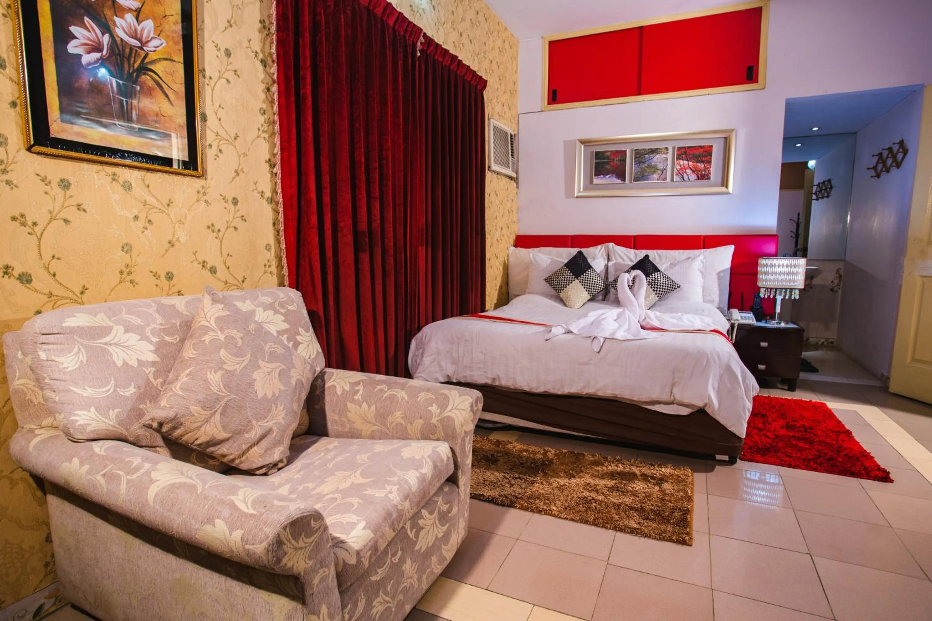 Seating area, Bed in Babylon Hotel & Serviced Apartment