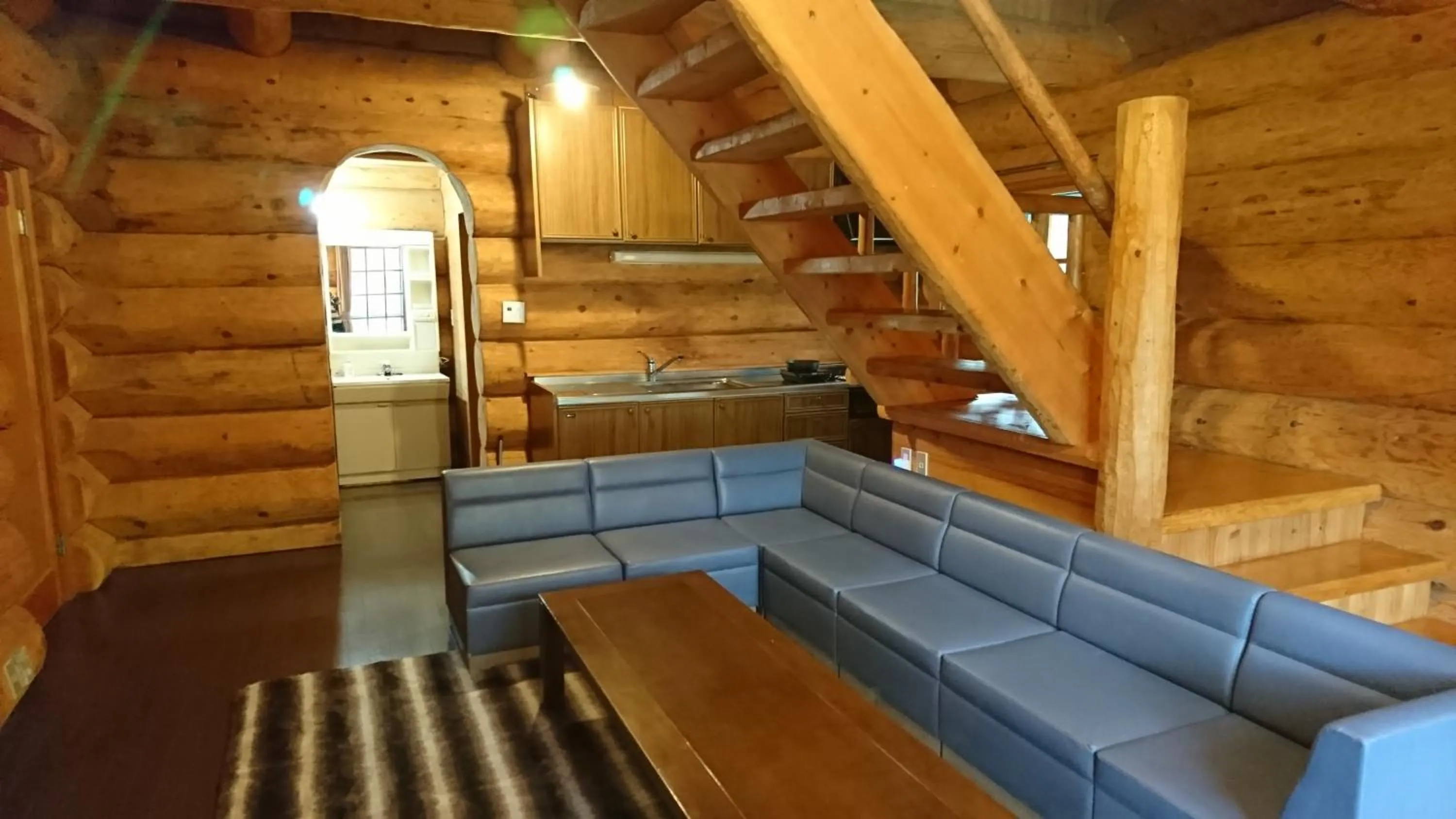 Living room in White Tree Log House Madarao Tangram