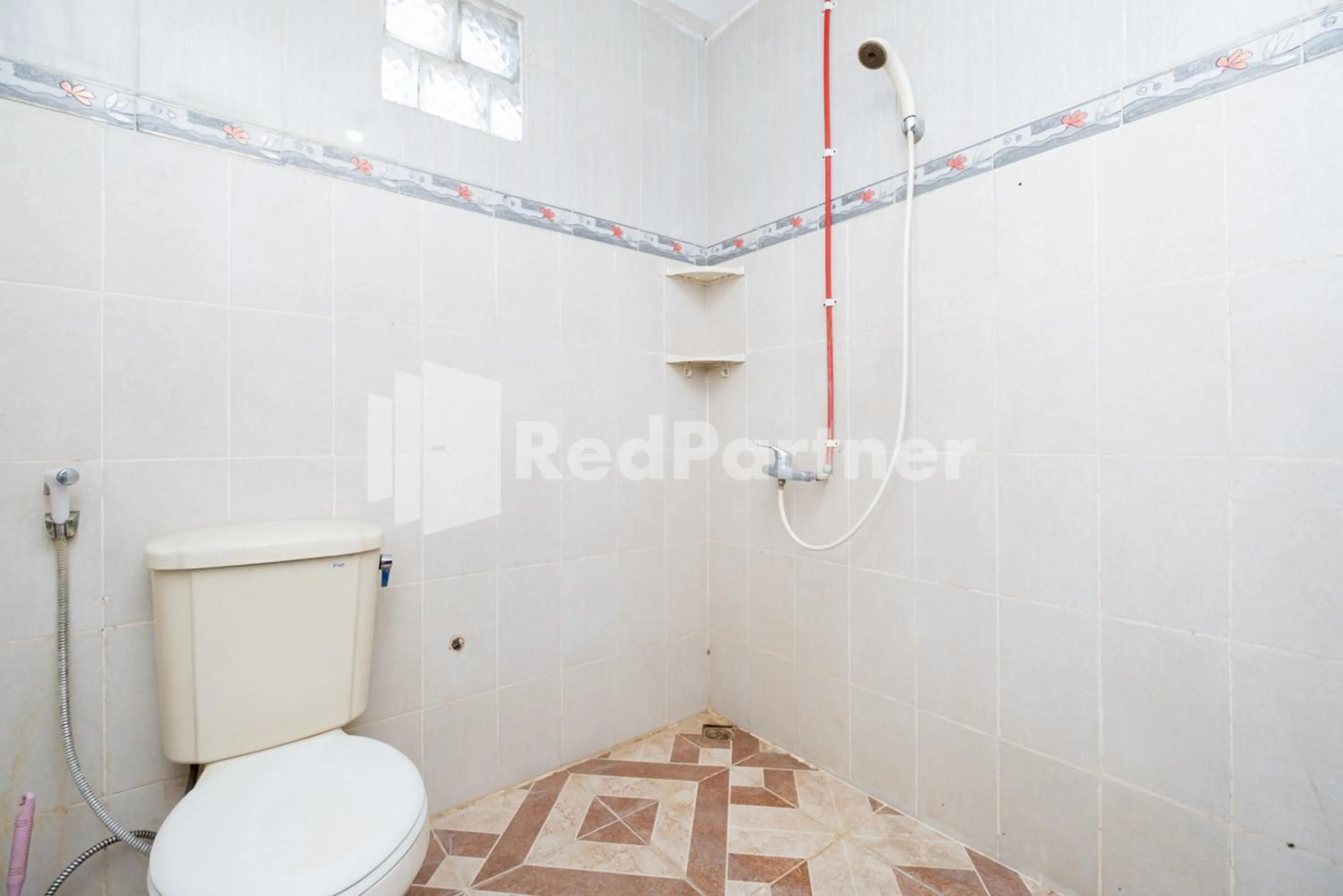 Bathroom in Dukuh Kupang Residence Mitra RedDoorz