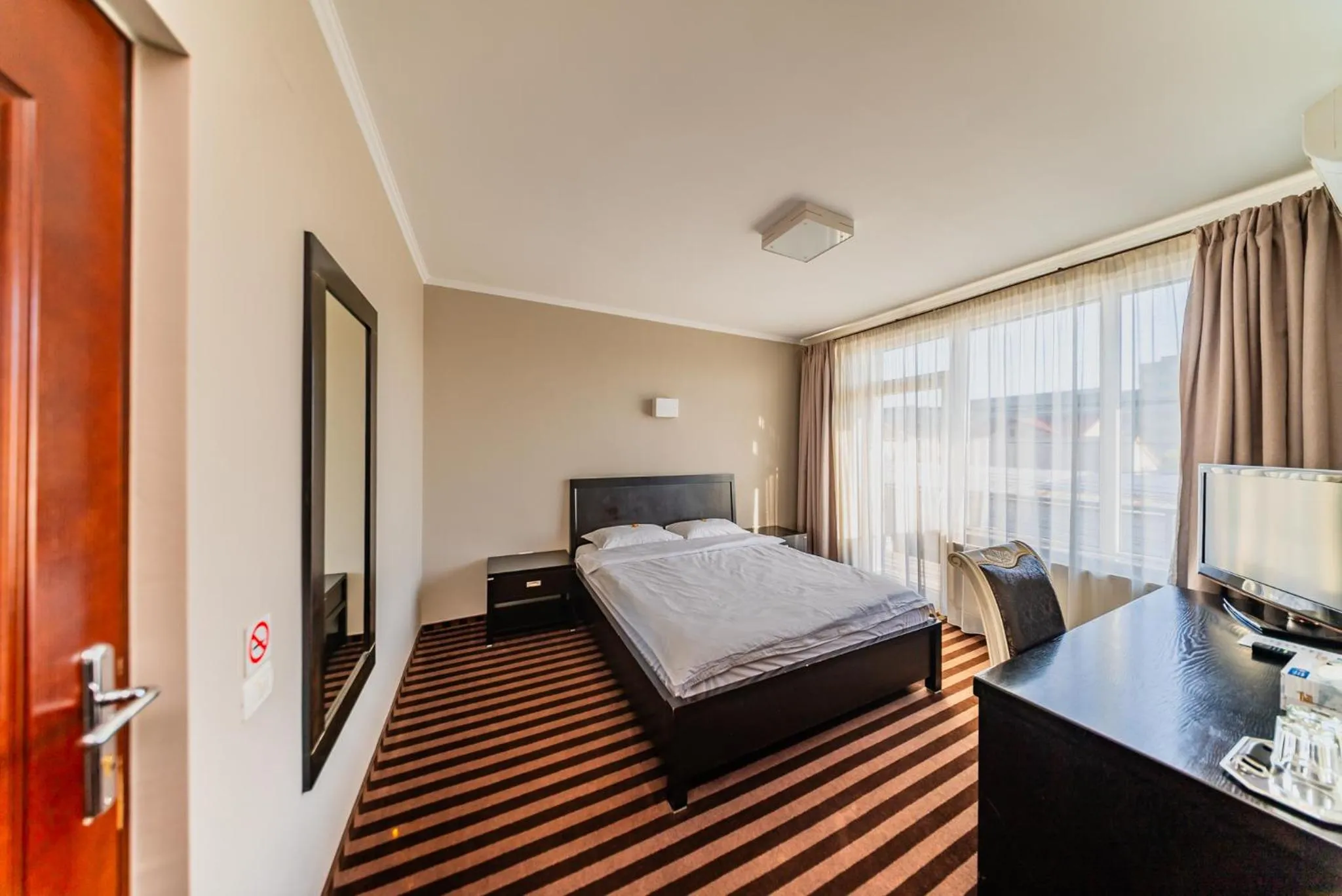 Bed in Pensiunea Belanco