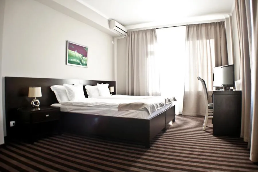 Bed in Pensiunea Belanco