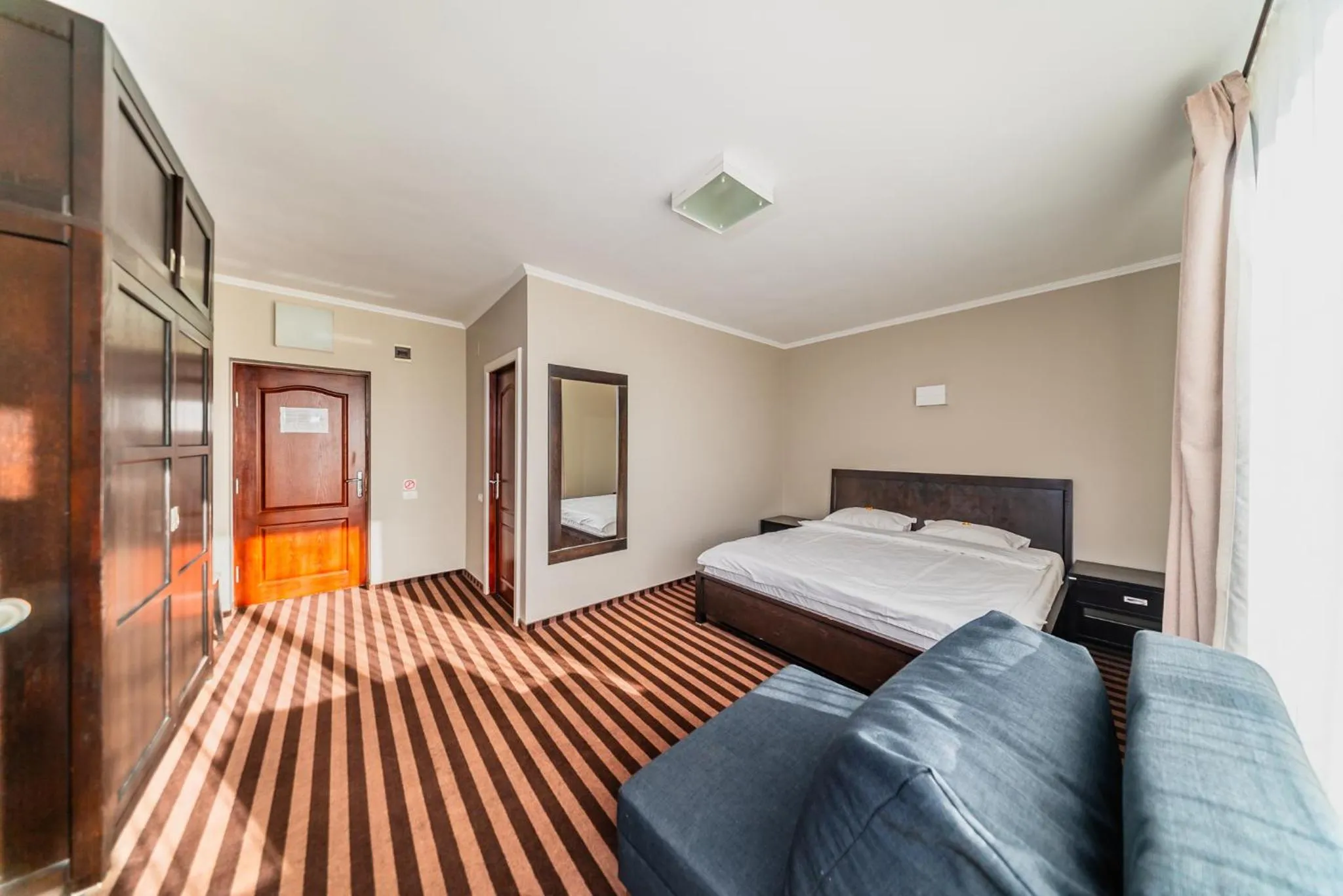 Bed in Pensiunea Belanco