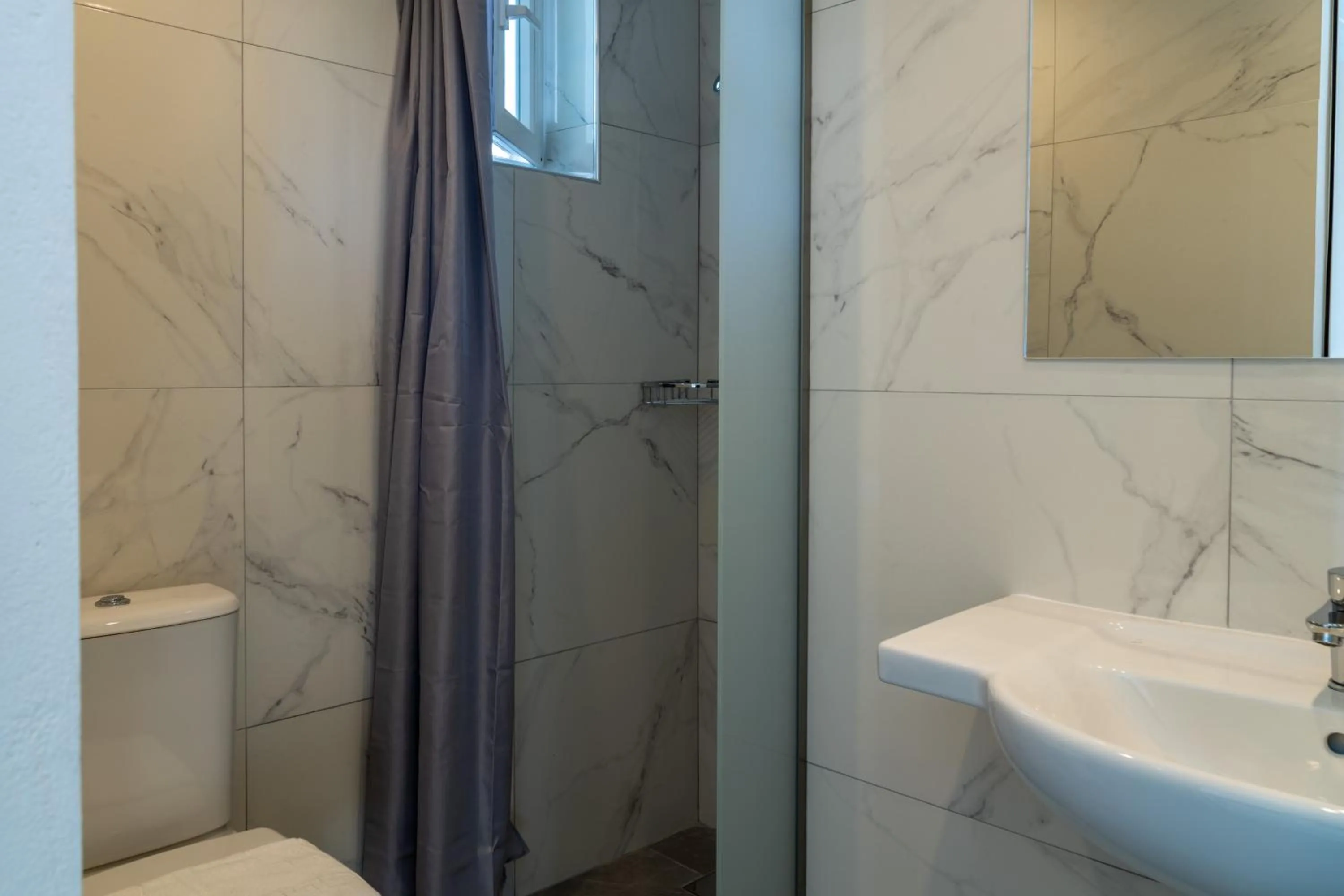 Bathroom in Miros Hotel Apartments