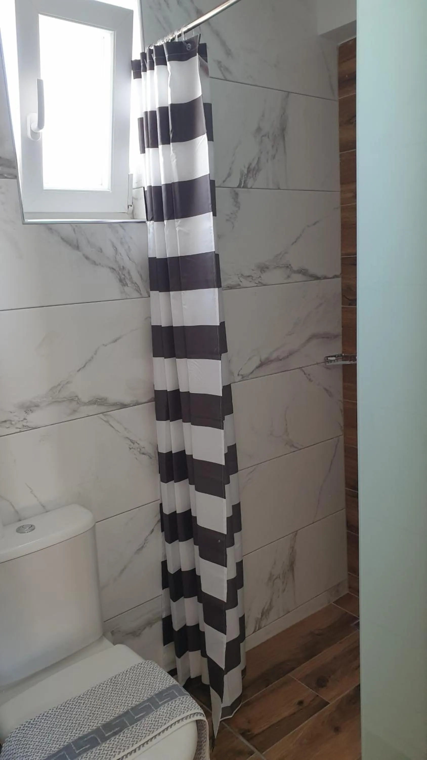 Bathroom in Miros Hotel Apartments