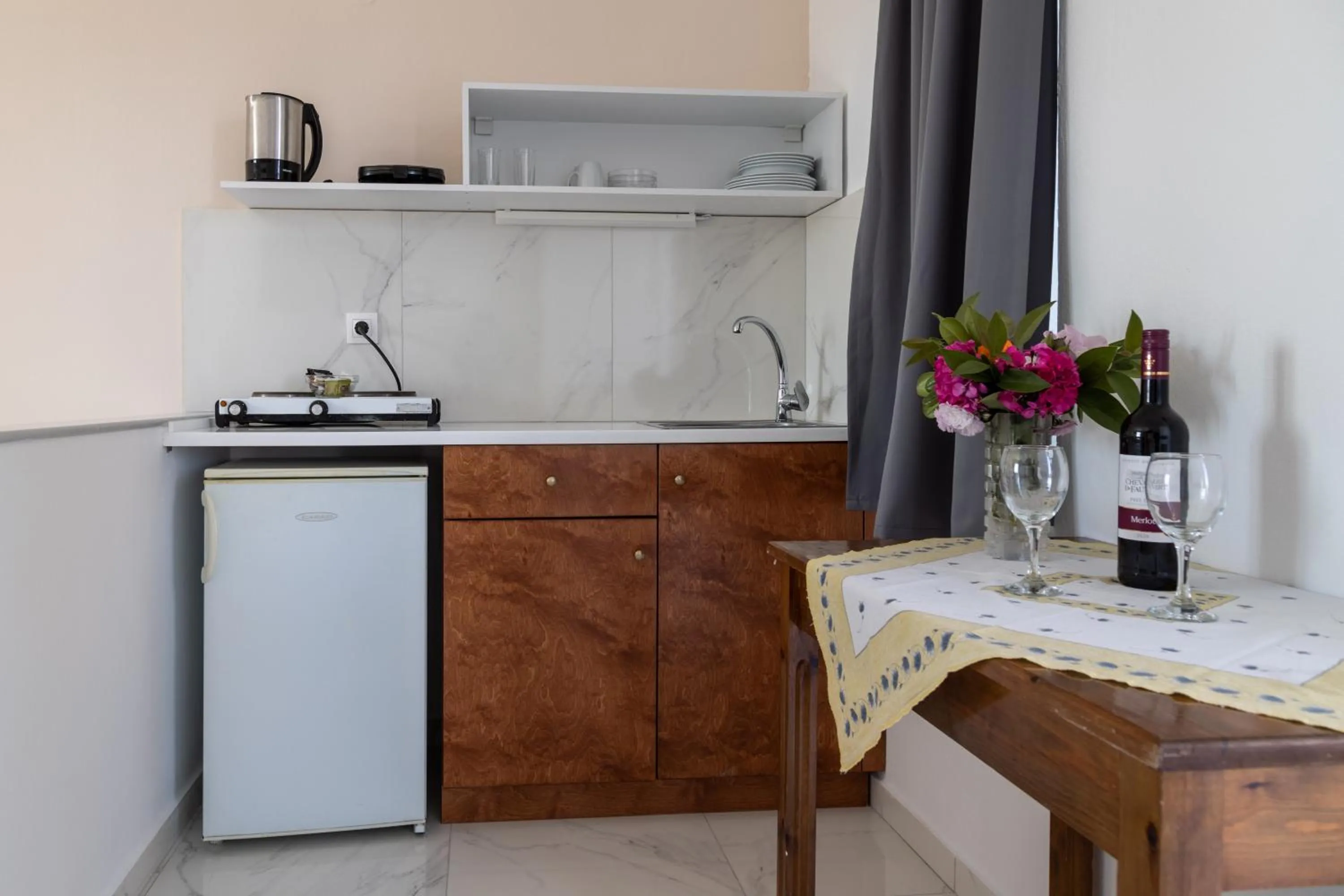 kitchen in Miros Hotel Apartments