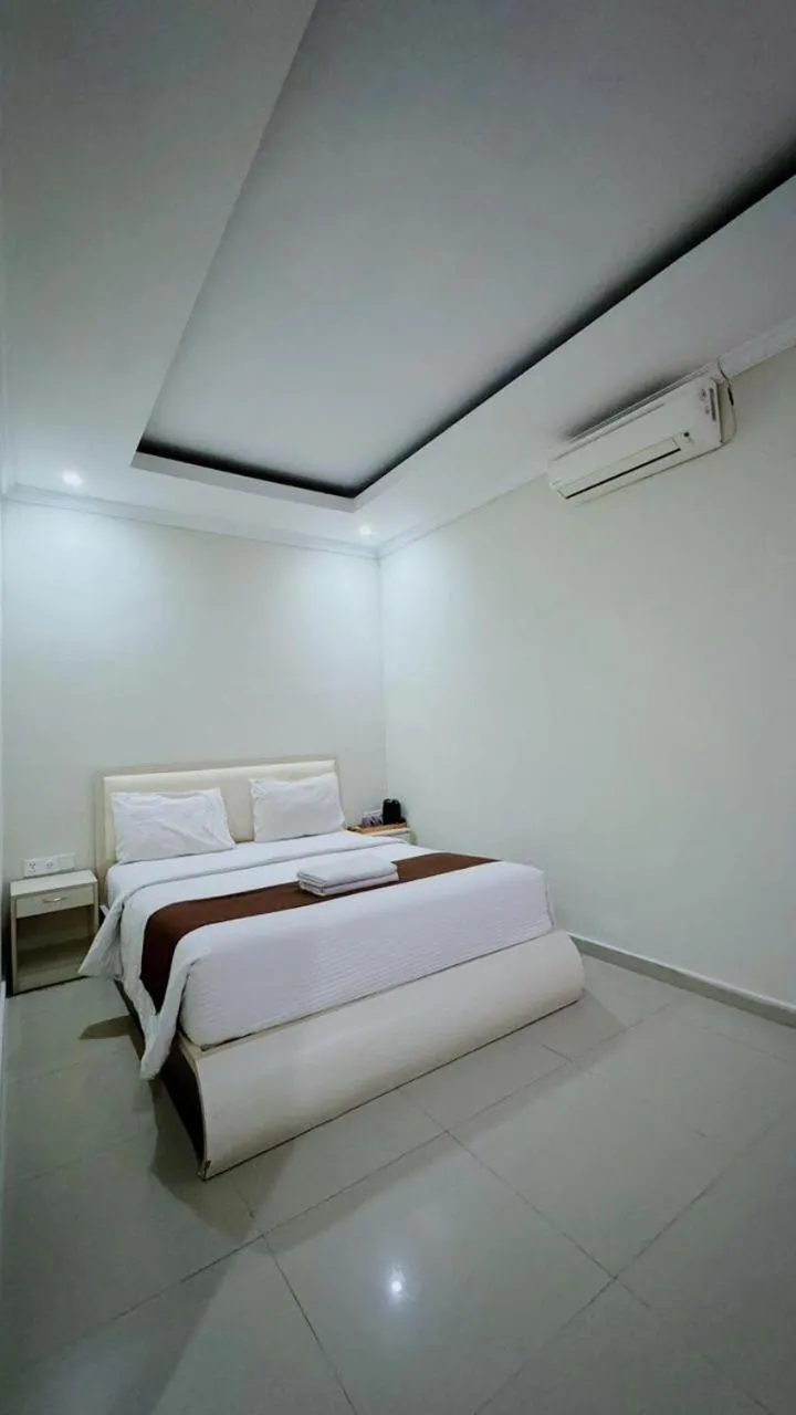 Bed in Dedy Beach Inn