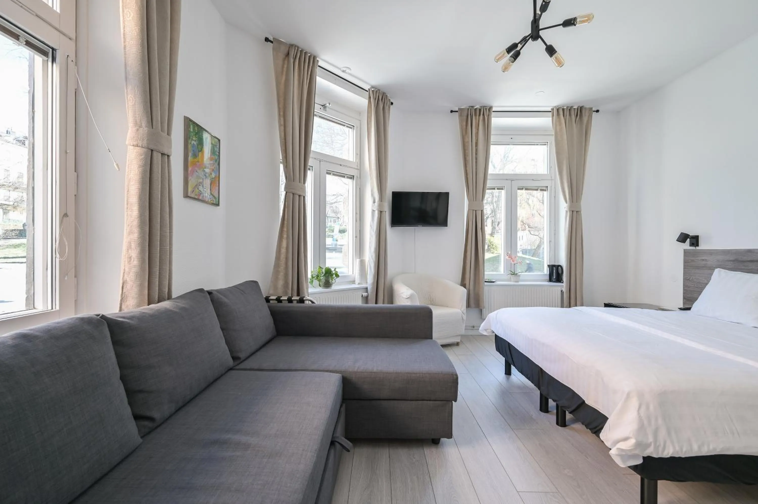 Living room, Bed in Hotel Bema