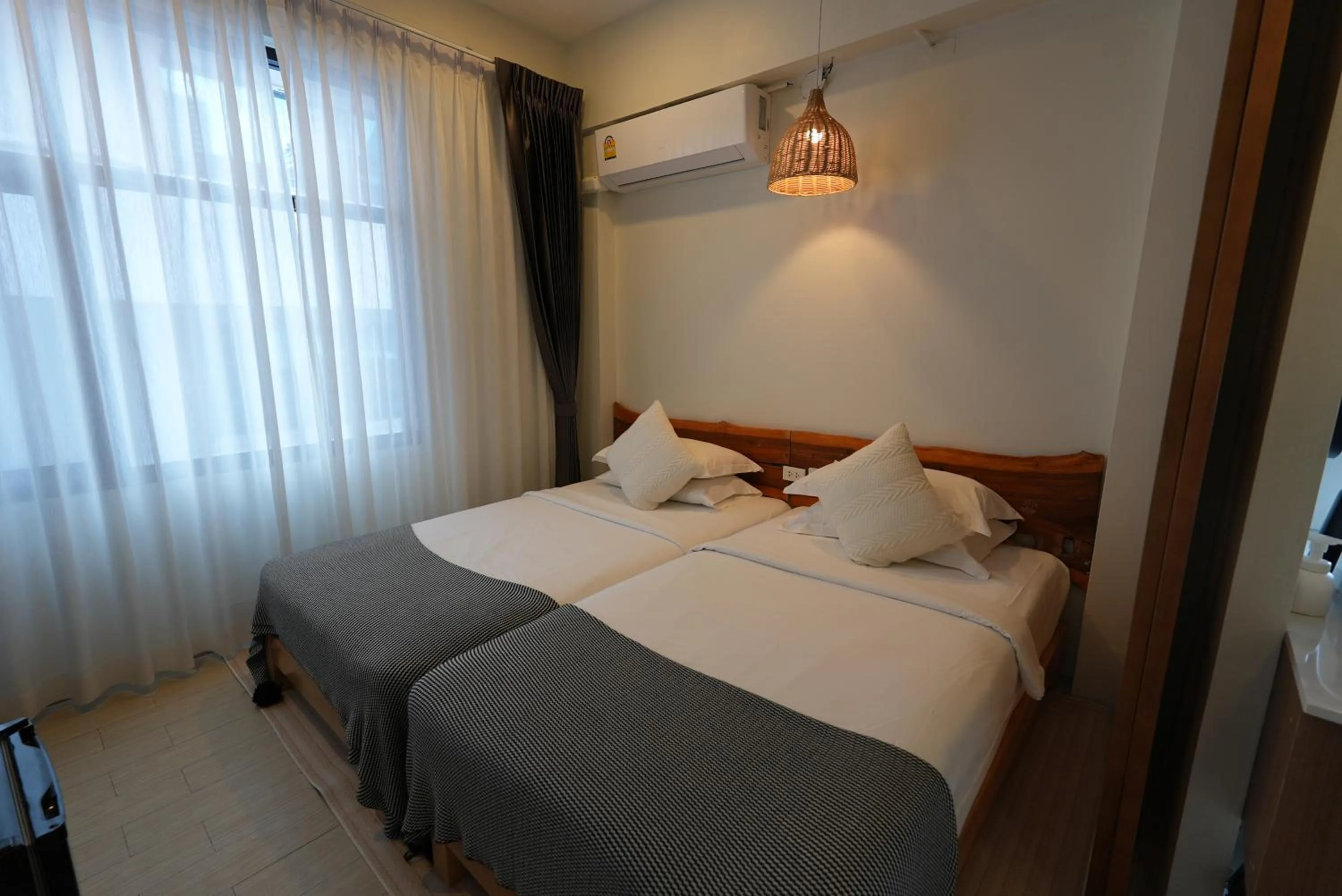 Bed in YOLO Bangkok Boutique Hotel