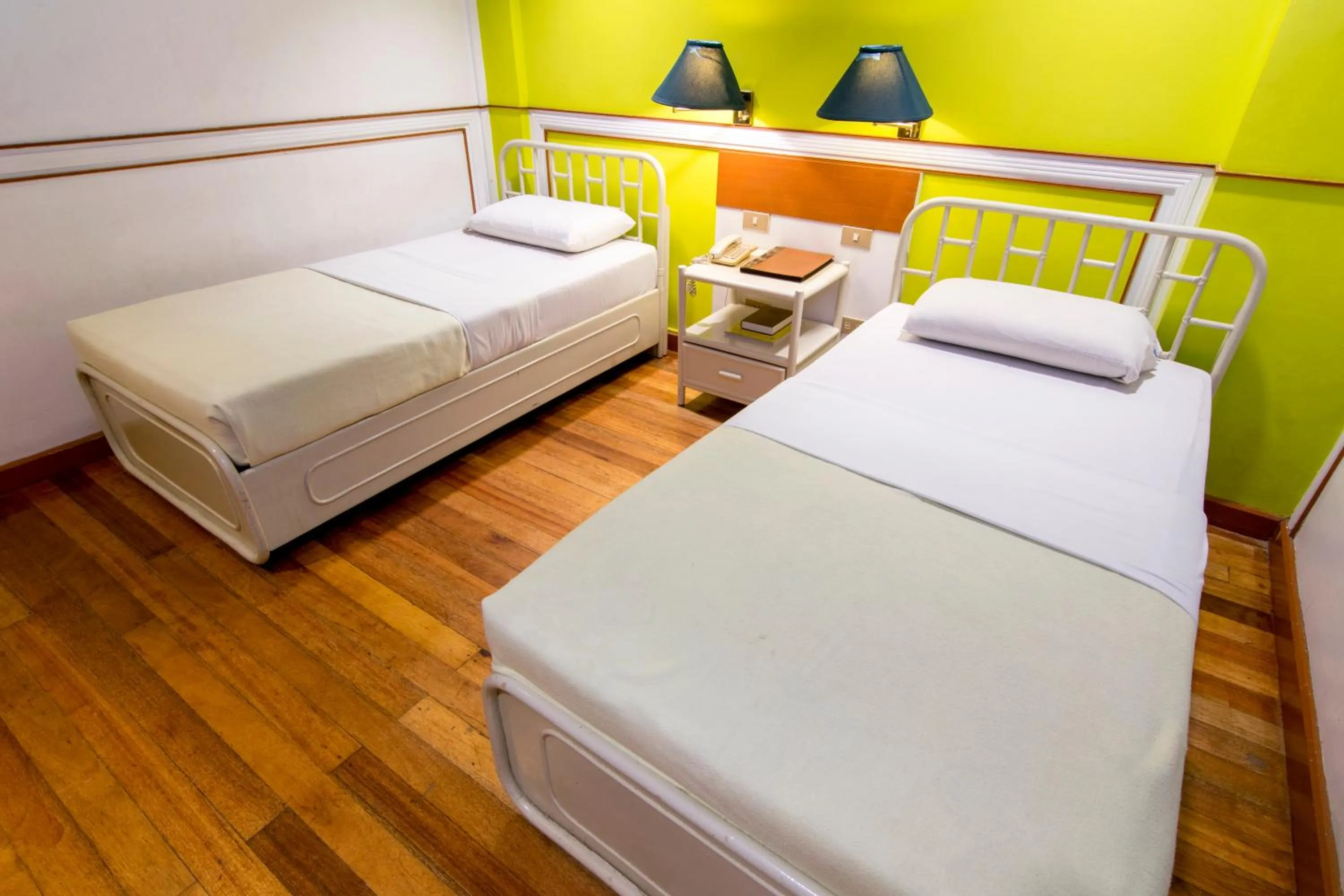 Bed in The Manor Hotel