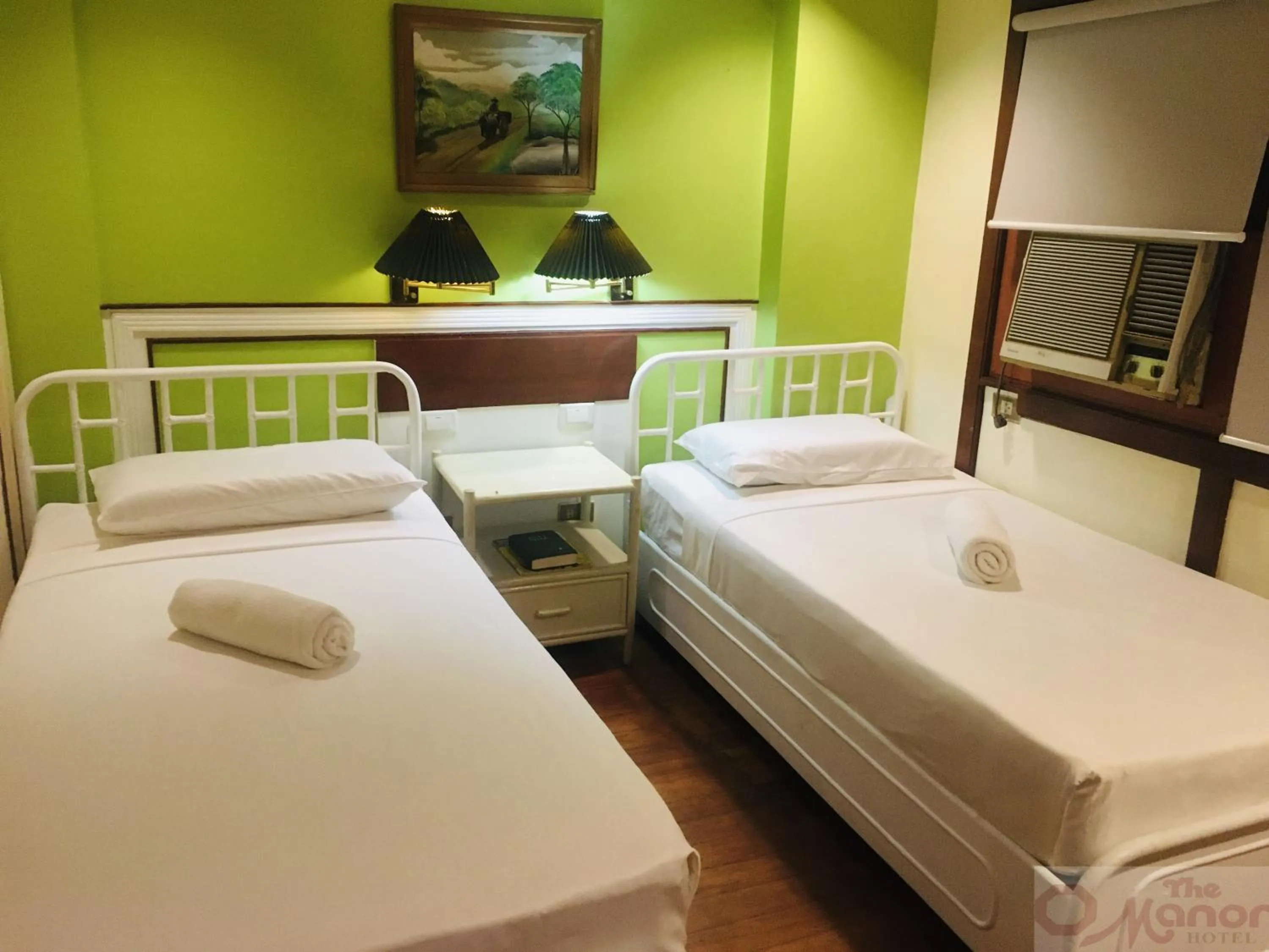 Bed in The Manor Hotel