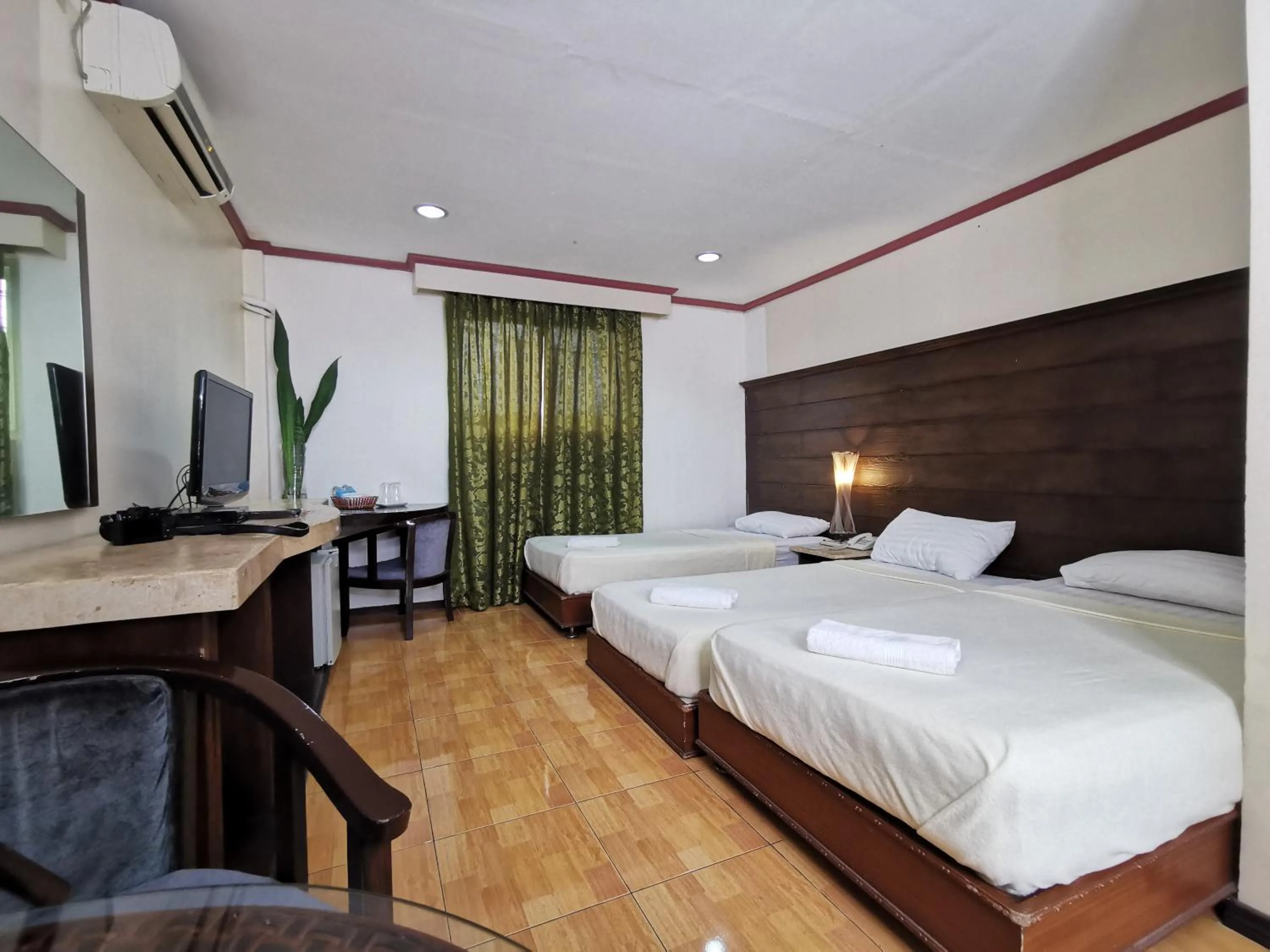 Bed in Cebu Hilltop Hotel