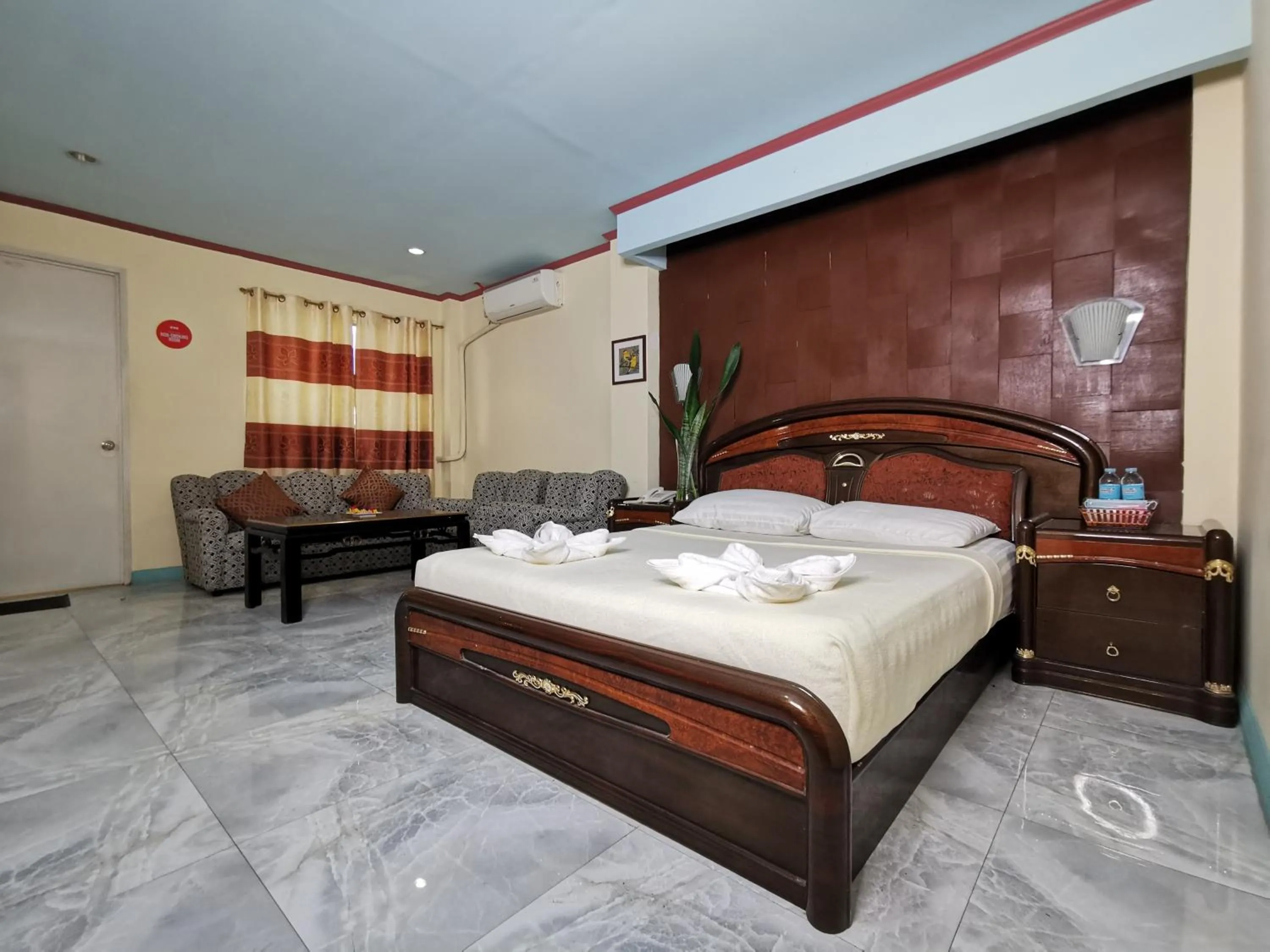 Bed in Cebu Hilltop Hotel