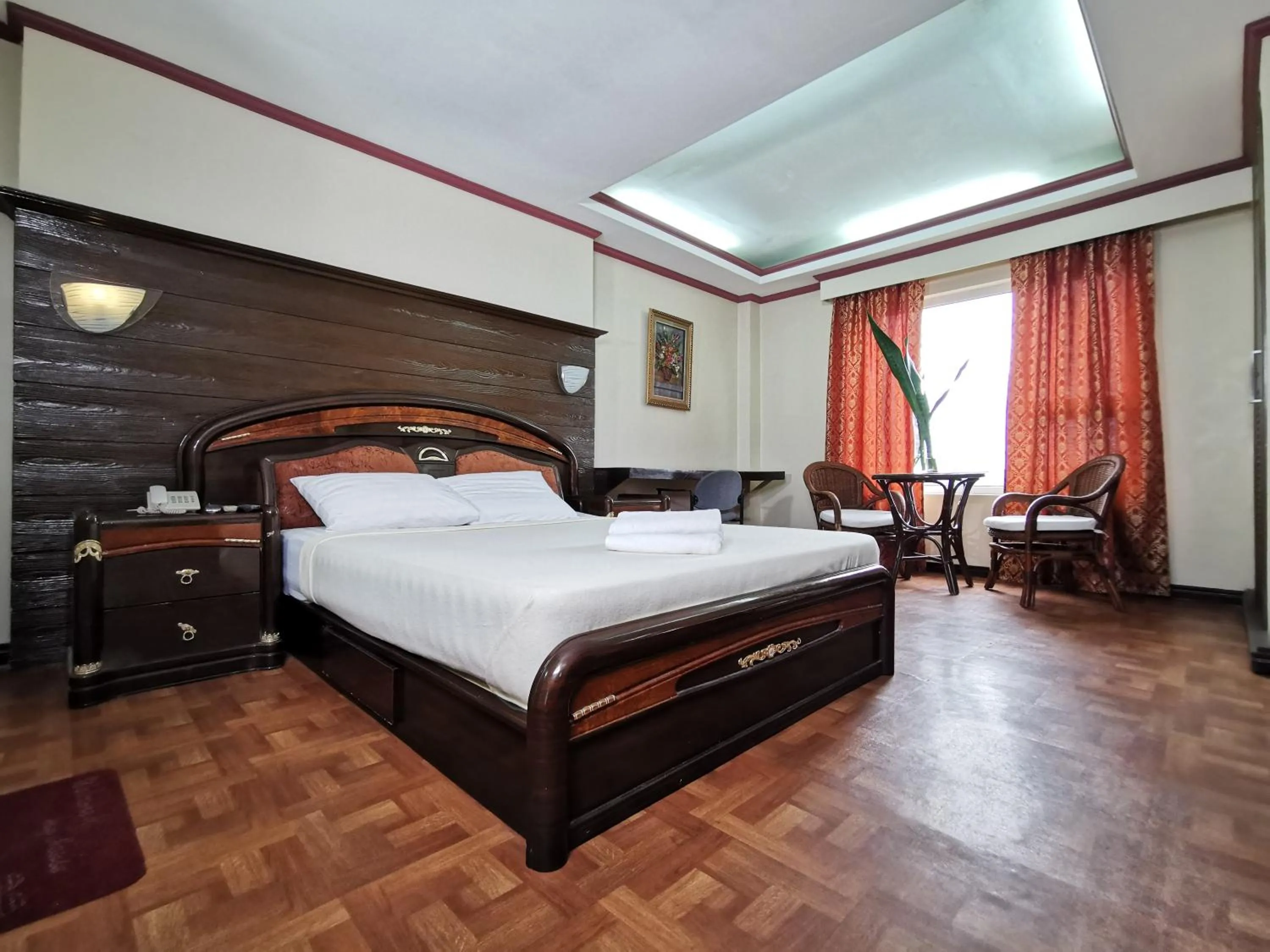 Bed in Cebu Hilltop Hotel