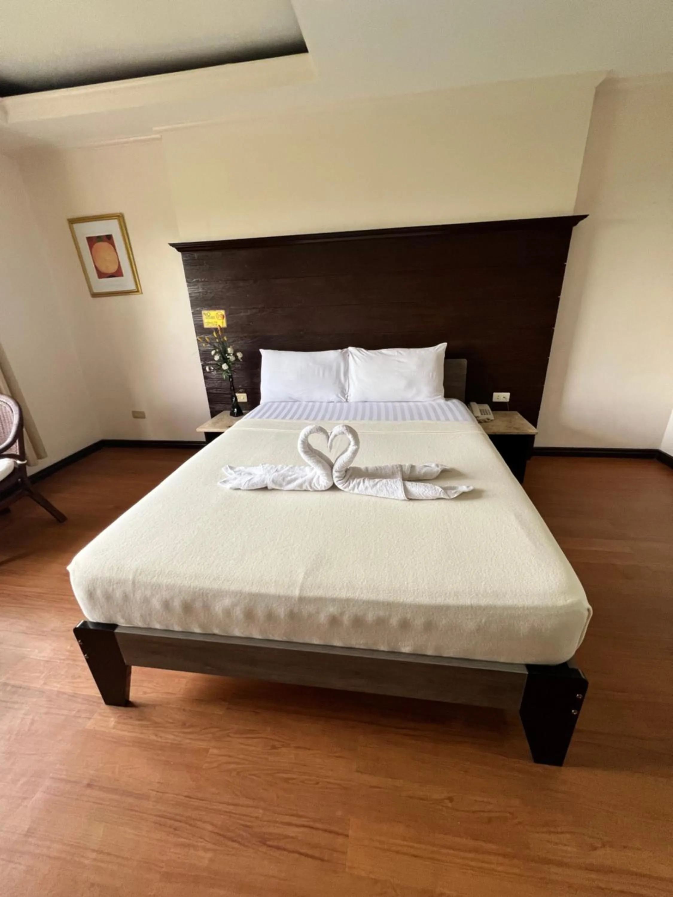 Bed in Cebu Hilltop Hotel