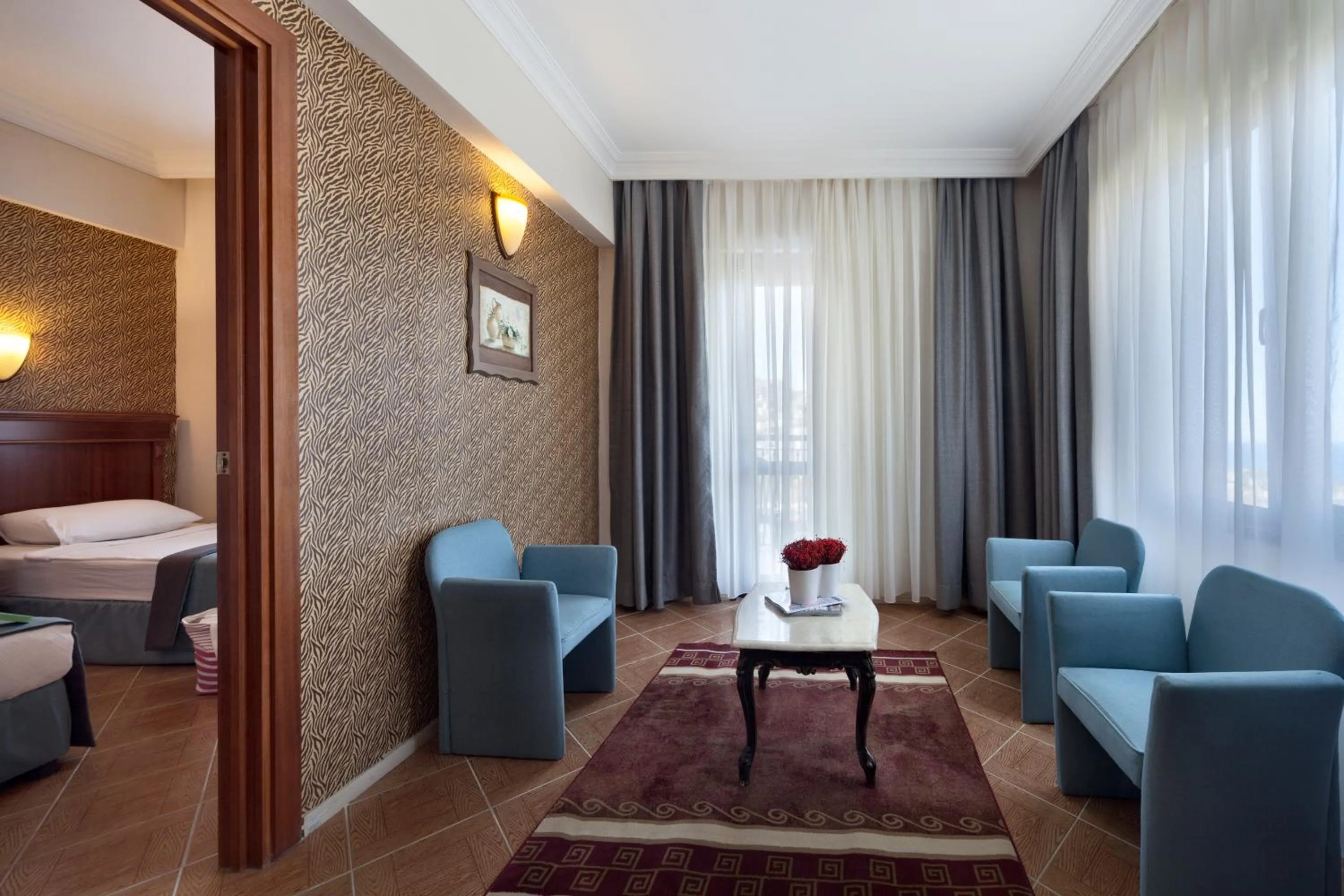 Seating area, Bed in Crystal Hotel Bodrum
