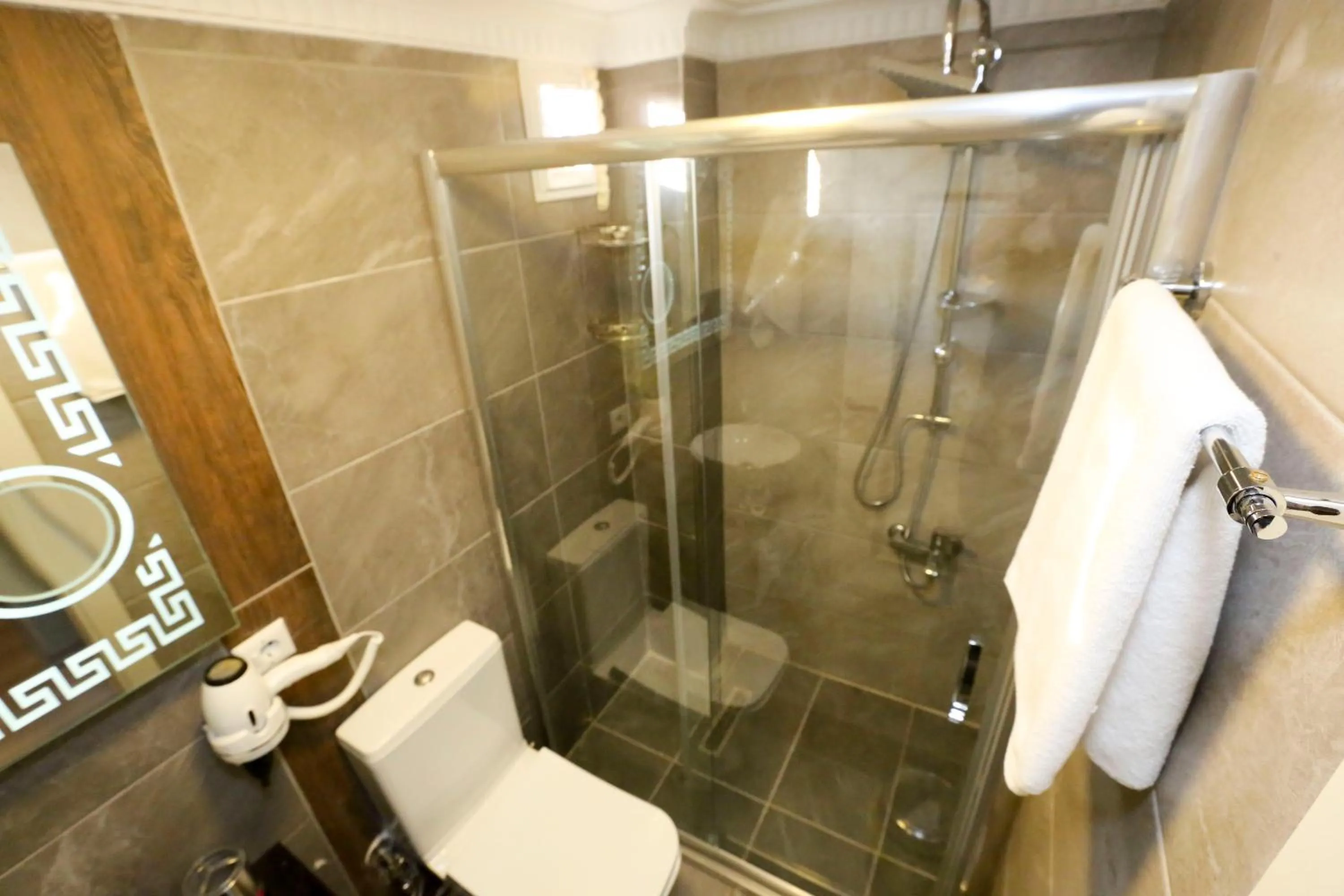 Shower in Grand Moon Hotel Suites