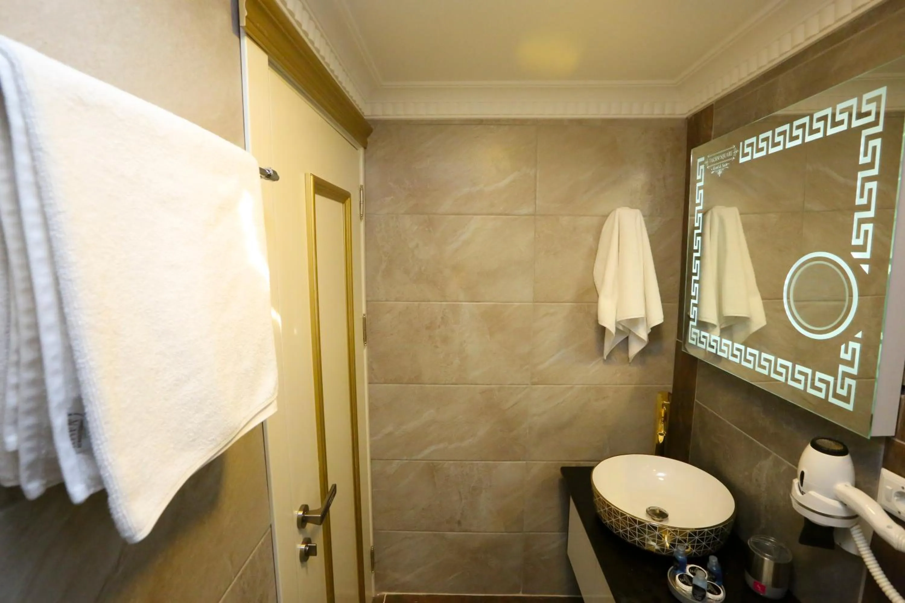 Shower in Grand Moon Hotel Suites