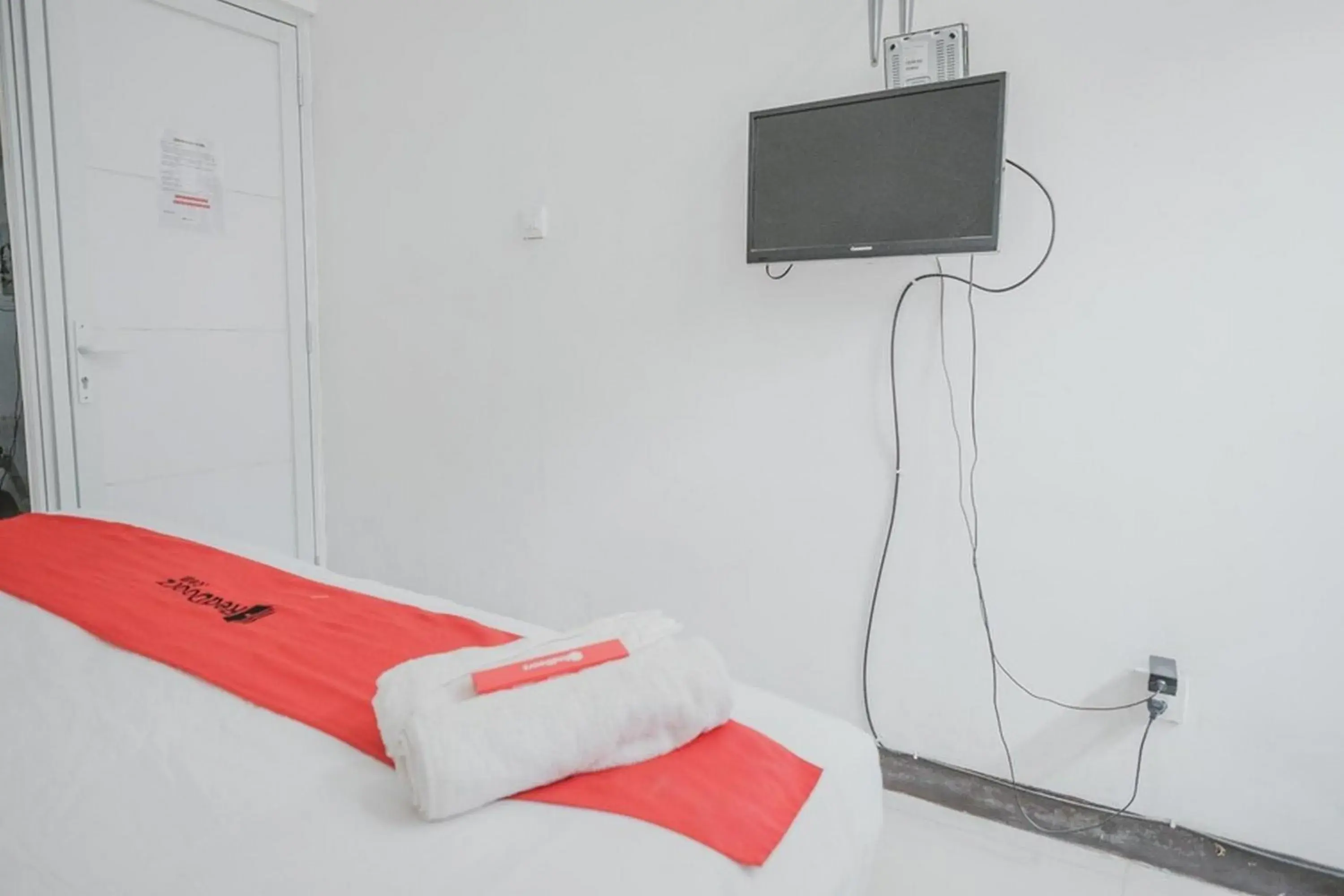 Bedroom in RedDoorz Syariah At Lampung Walk Bedroom in RedDoorz Syariah At Lampung Walk