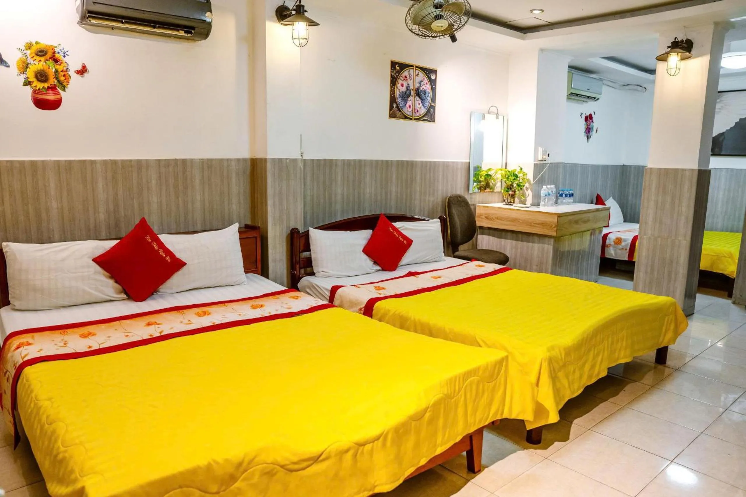 TV and multimedia, Bed in Kim Thuy Hotel