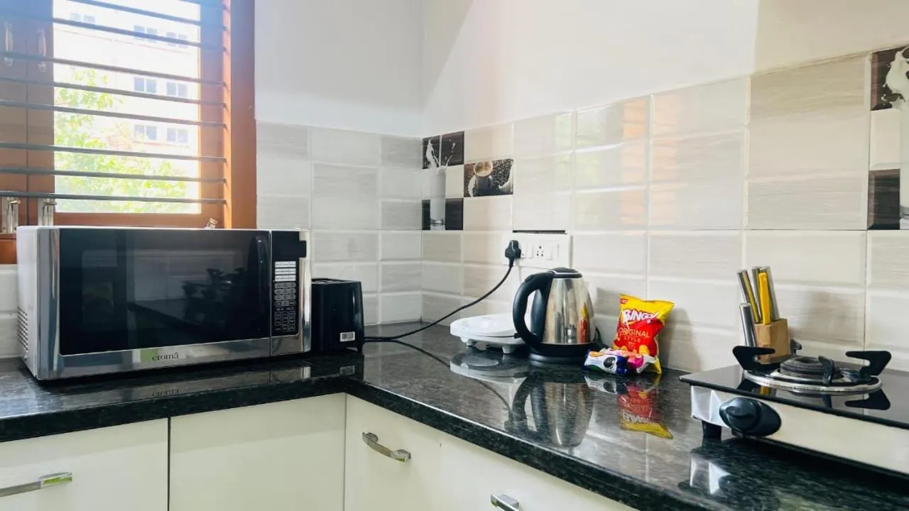 Kitchen or kitchenette in Olive Serviced Apartments HSR Layout