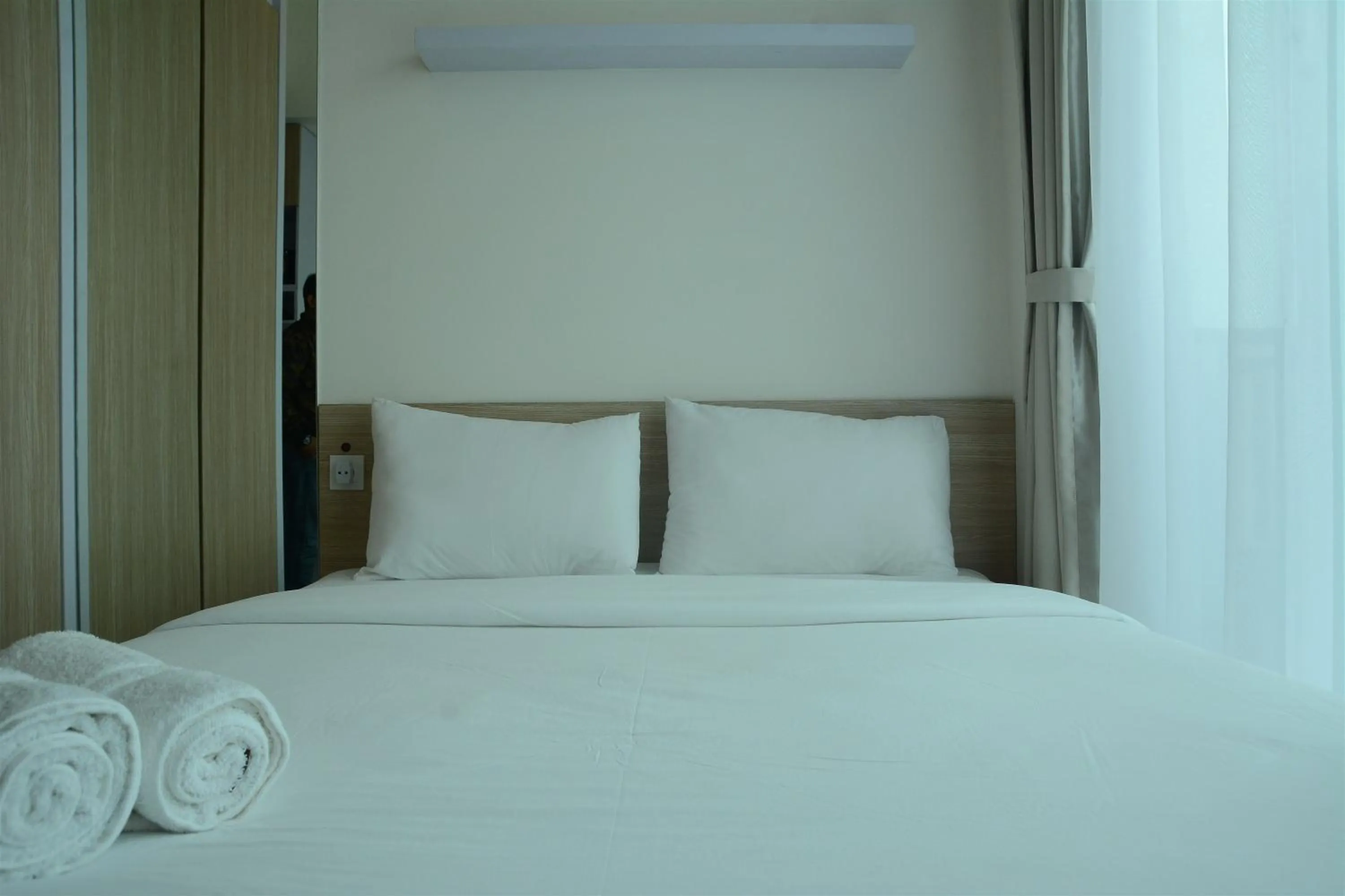 Bed in Brand New Studio Tree Park City BSD Apartment near ICE BSD By Travelio