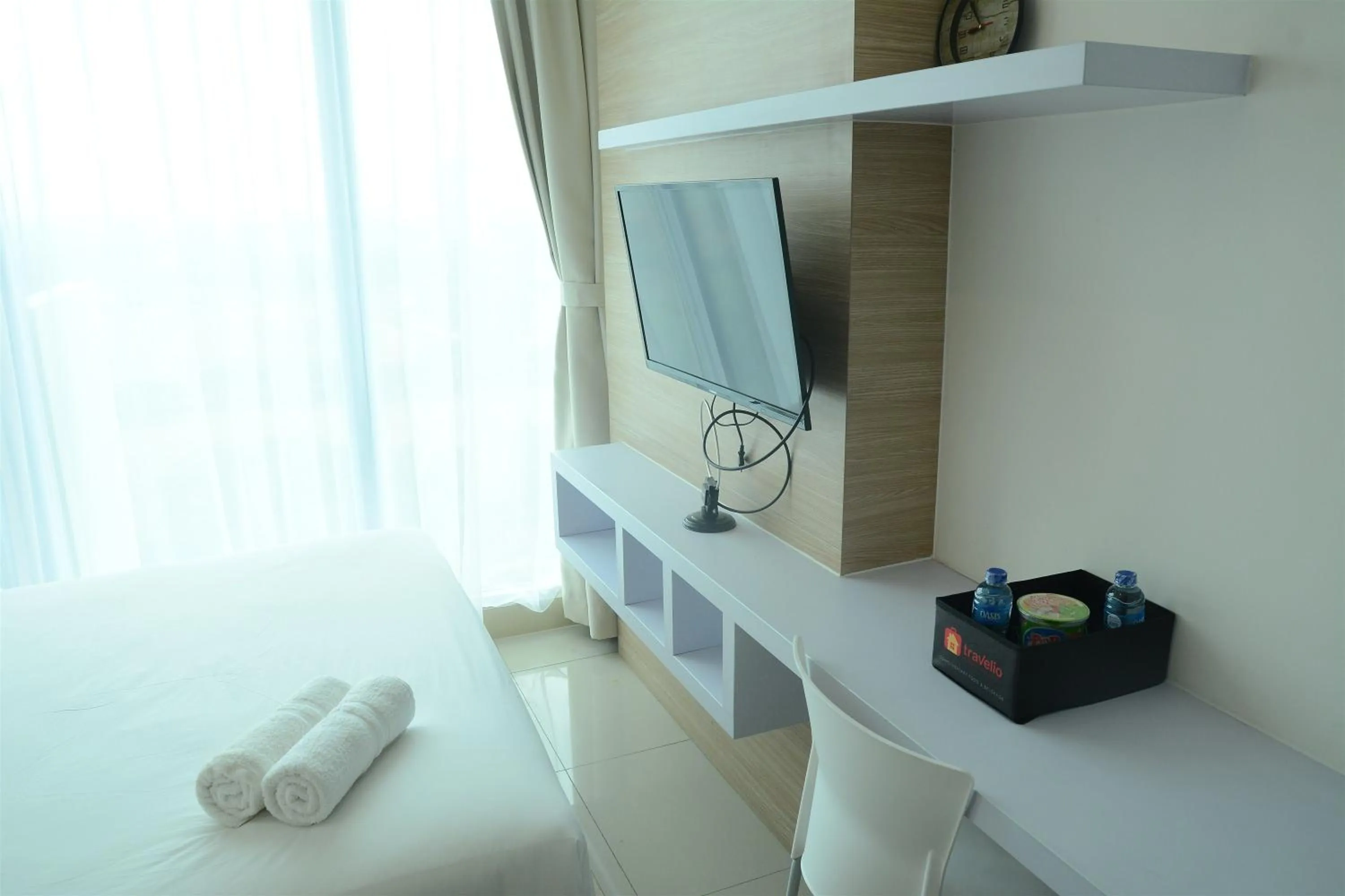 Bed in Brand New Studio Tree Park City BSD Apartment near ICE BSD By Travelio