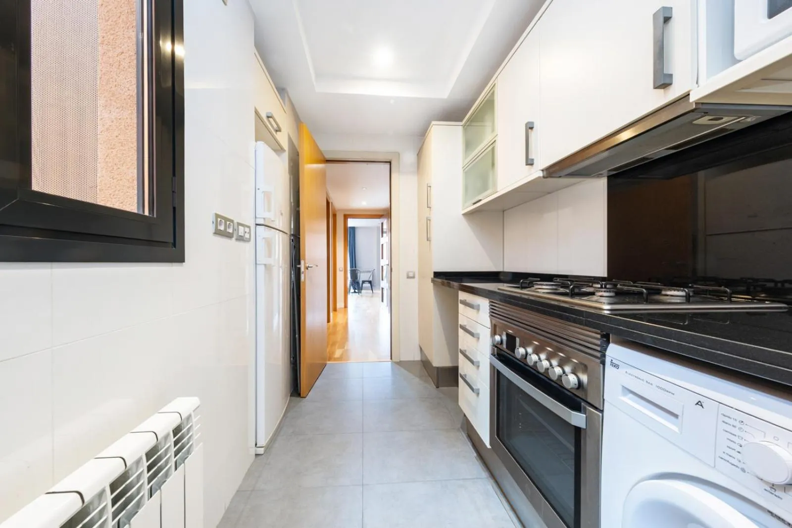 Kitchen or kitchenette in AinB Sagrada Familia Apartments