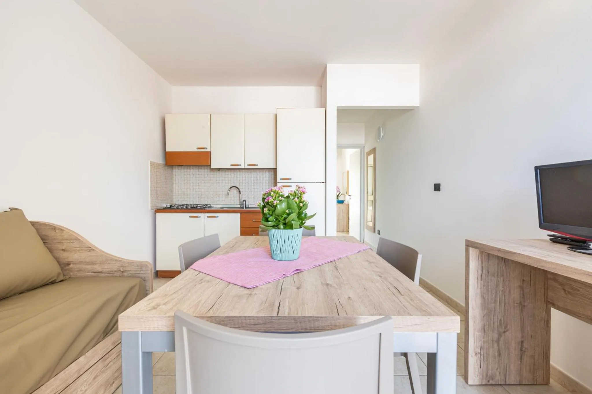 Communal lounge/ TV room in Hotel Residence Miramare