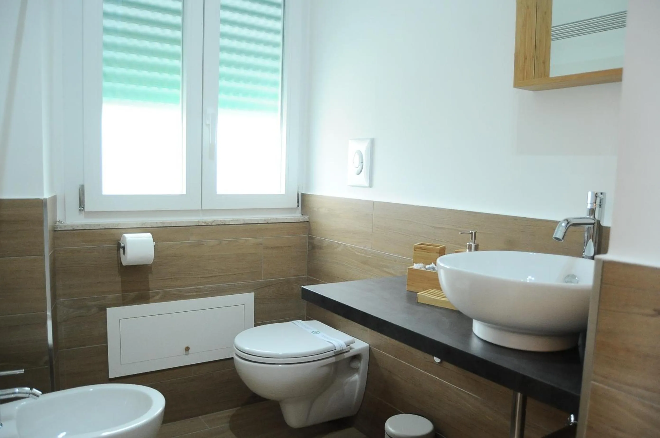 Toilet in The Corner 180 Suite