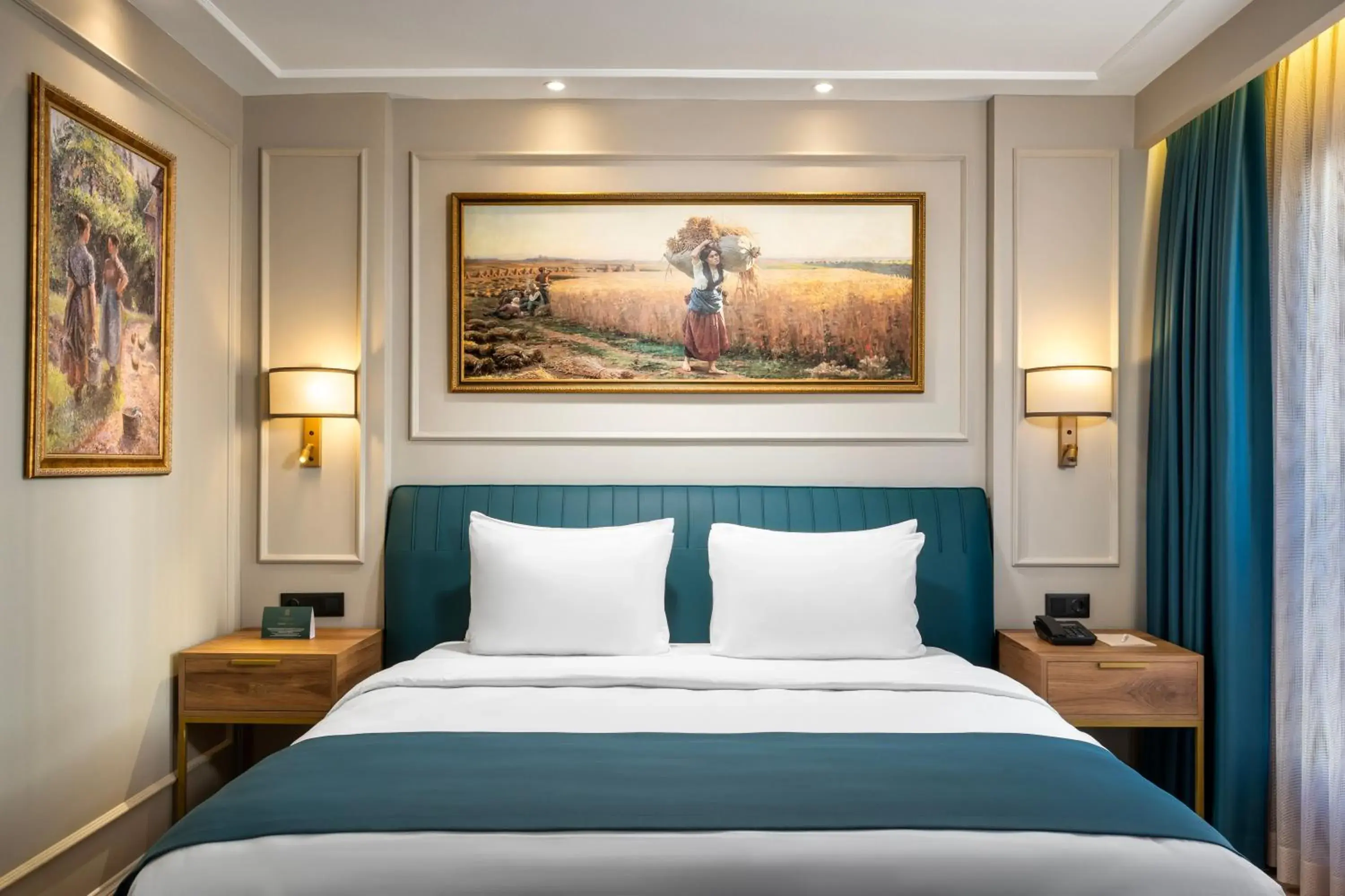 Bed in Royan Suites Bed in Royan Suites