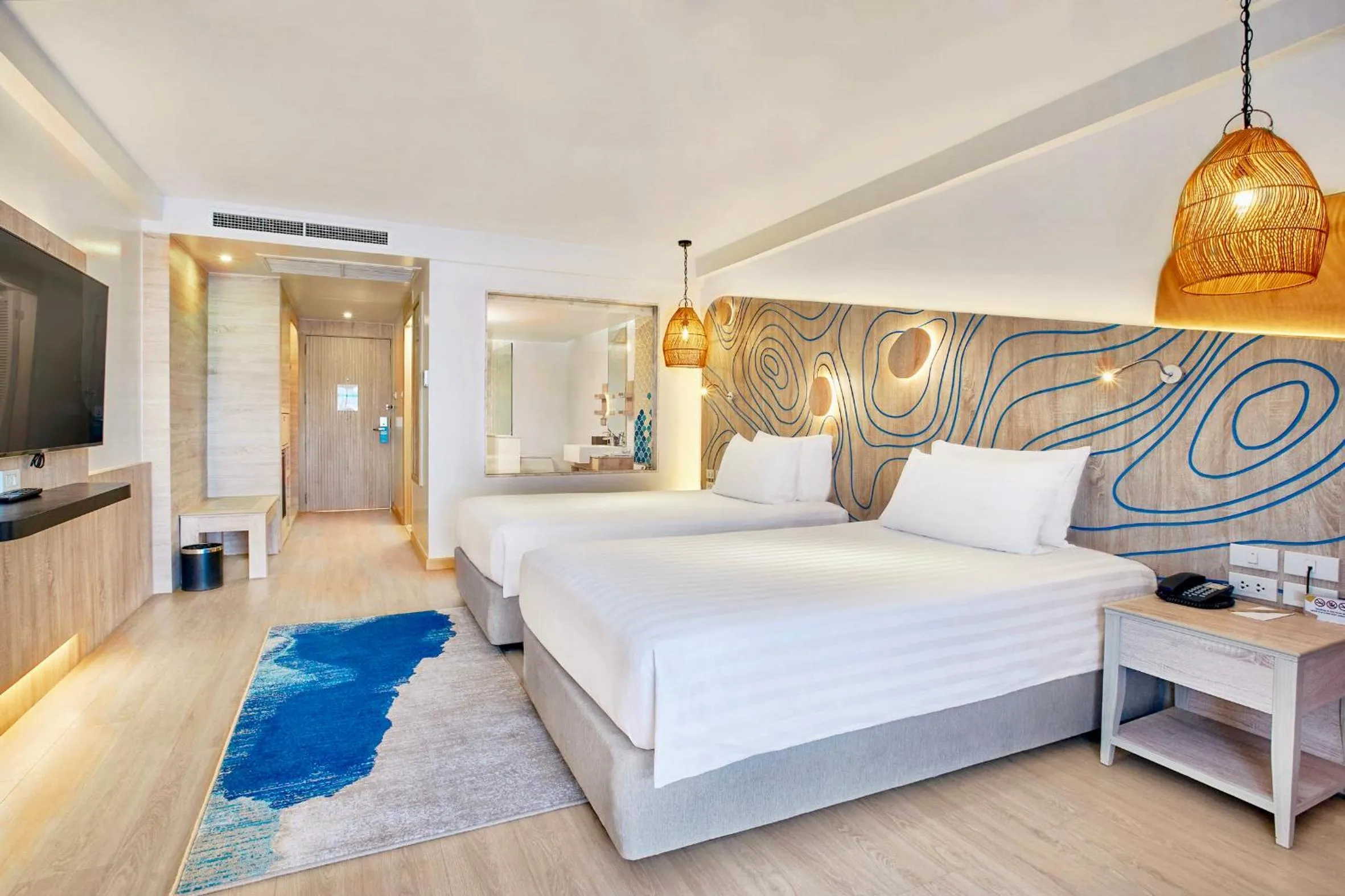 Bed in LIV Hotel Phuket Patong Beachfront