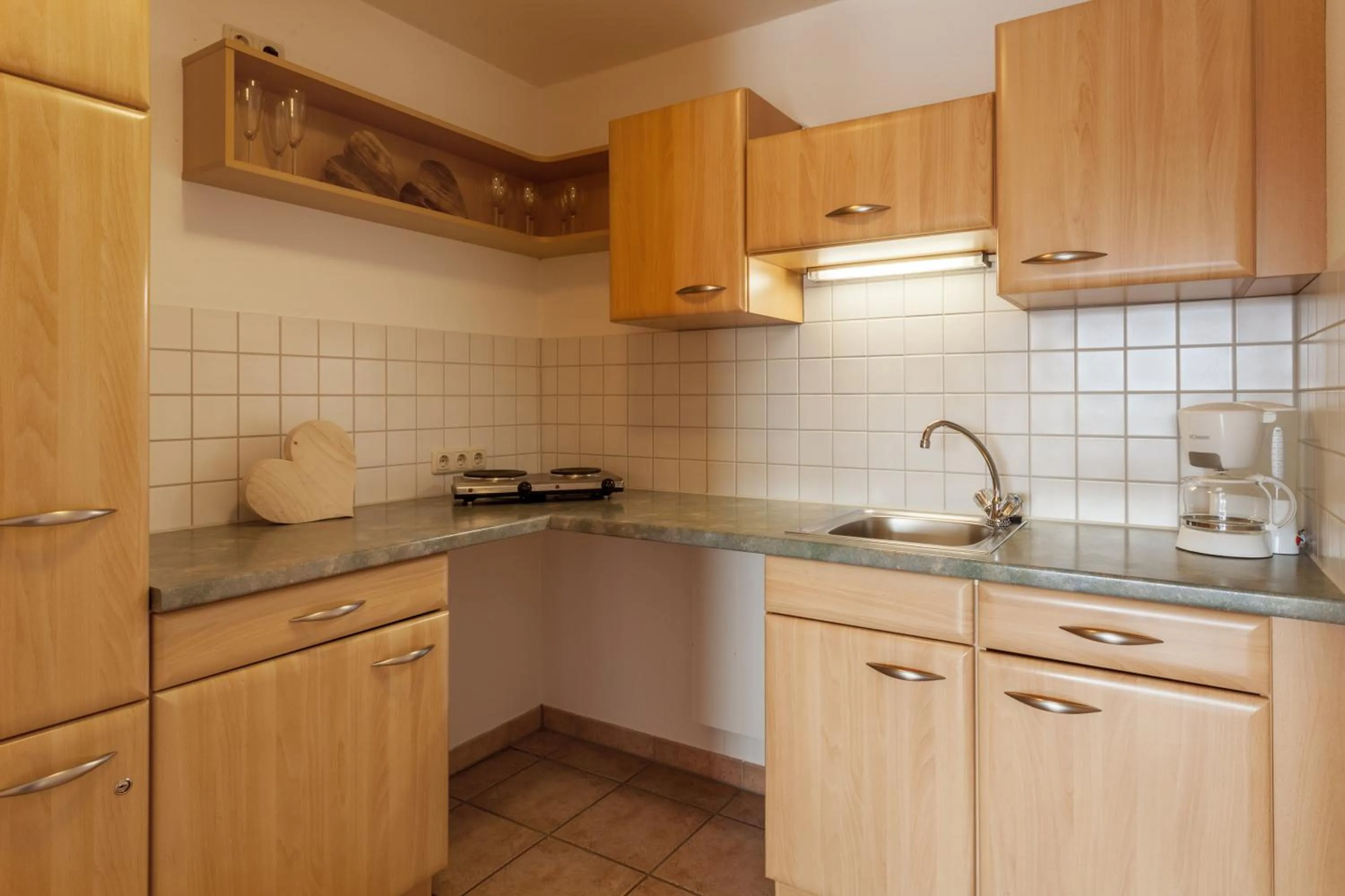 Kitchen or kitchenette in Hartungs Hoteldorf