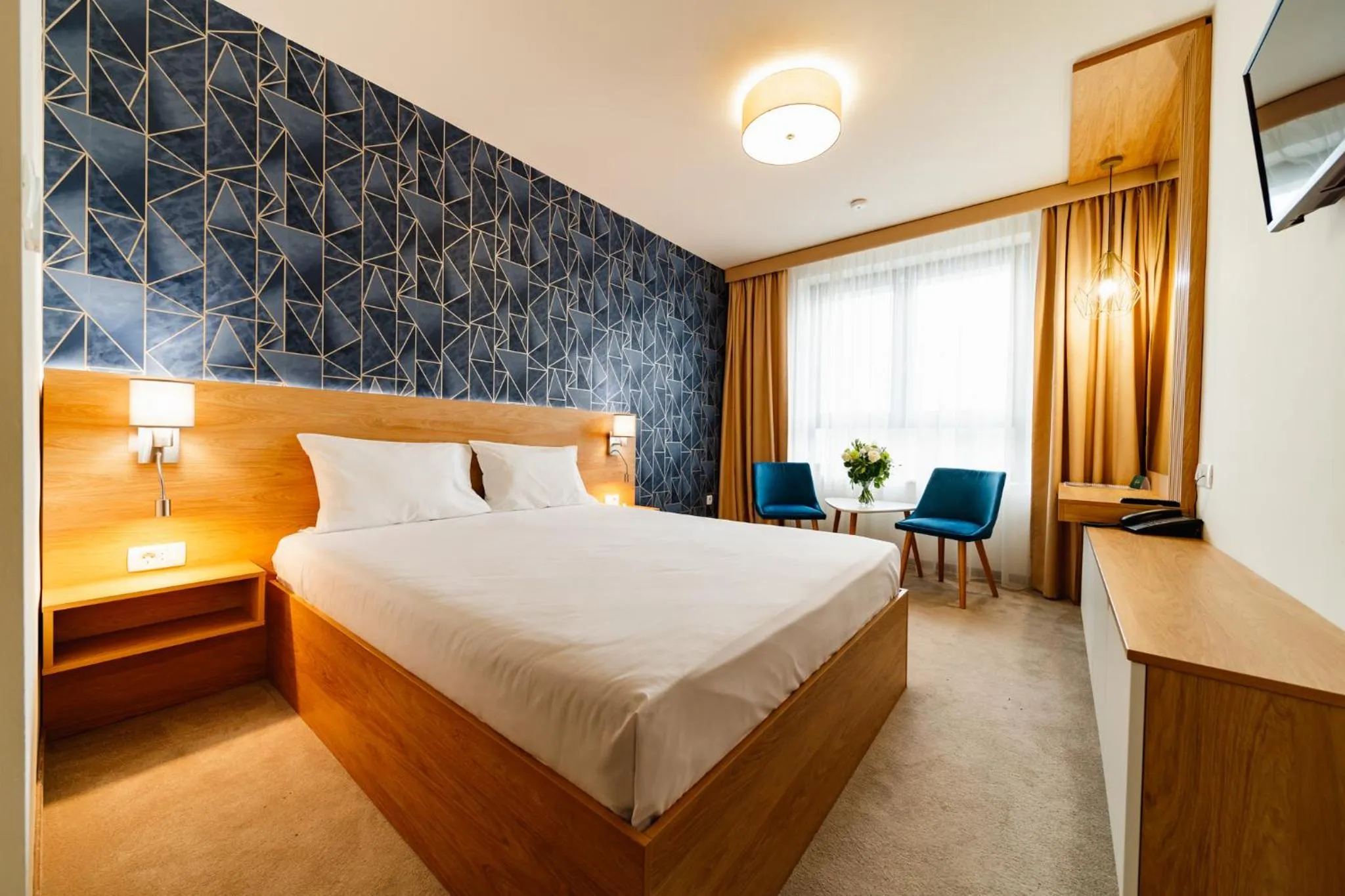 Bed in Hotel Küküllő - Târnava