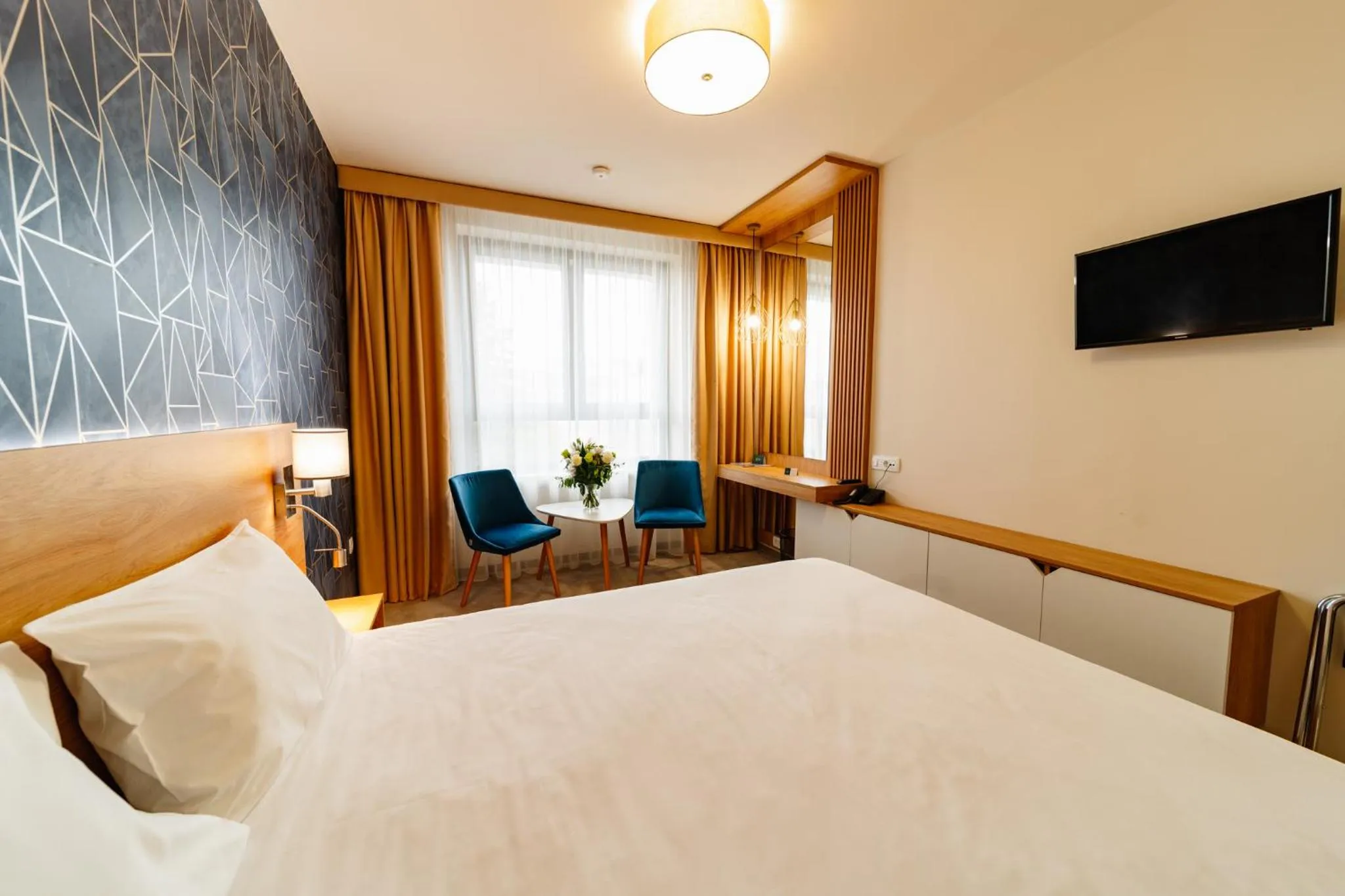 Bed in Hotel Küküllő - Târnava